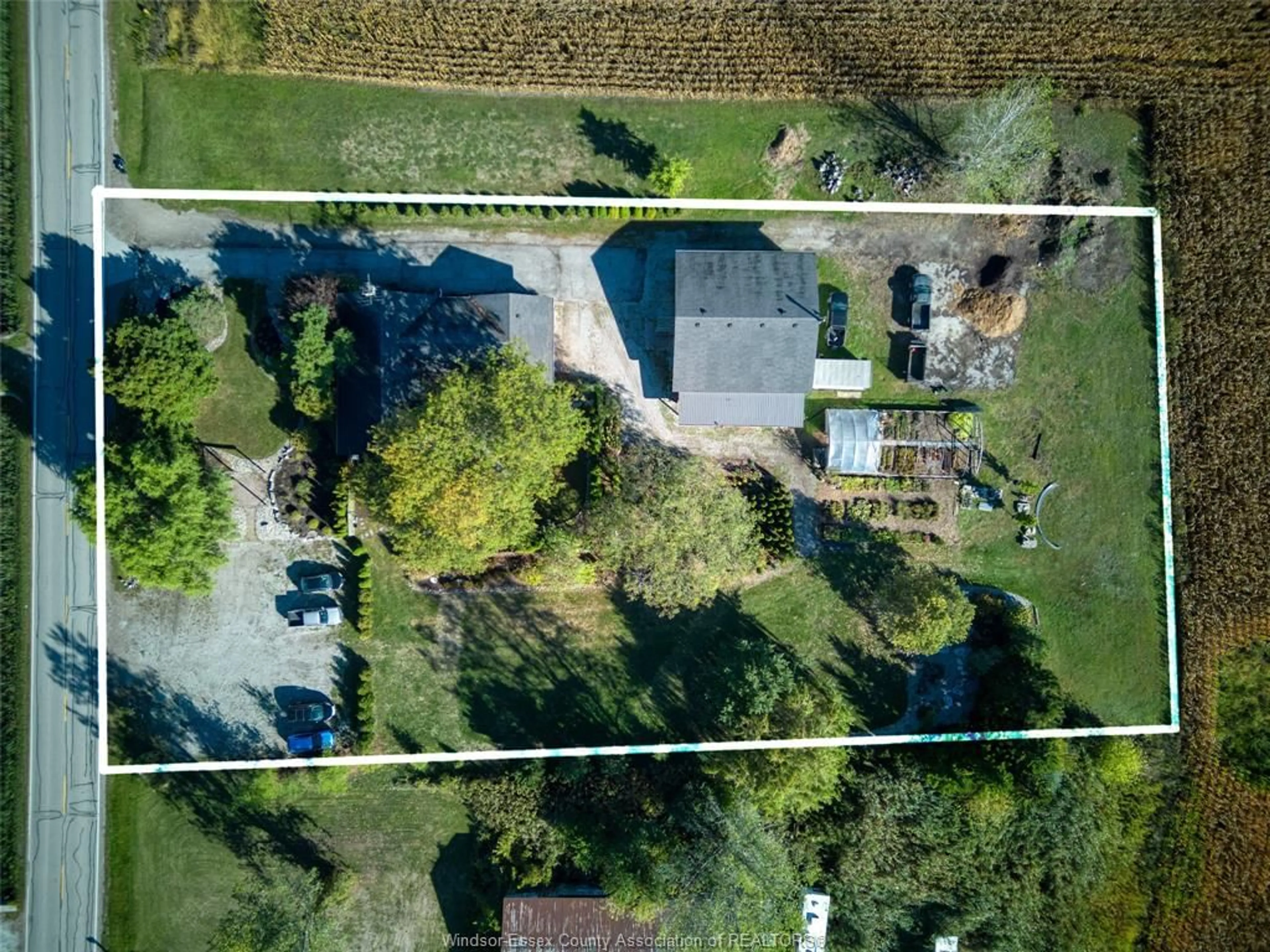 A pic from outside/outdoor area/front of a property/back of a property/a pic from drone, street for 4774 8TH CONCESSION RR3, Windsor Ontario N0R 1K0