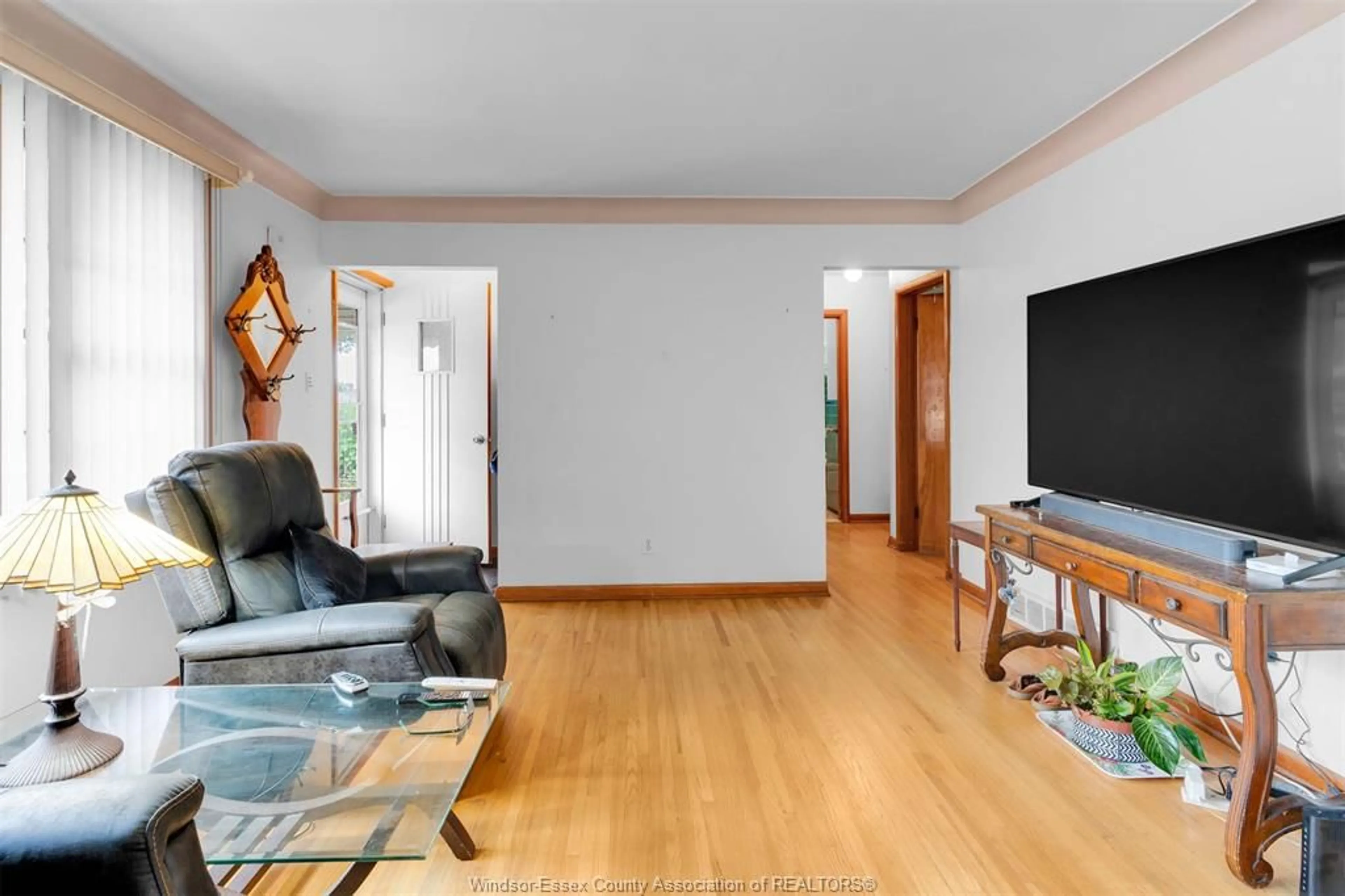 Living room with furniture, wood/laminate floor for 1358 JOSEPHINE Ave, Windsor Ontario N9B 2L9