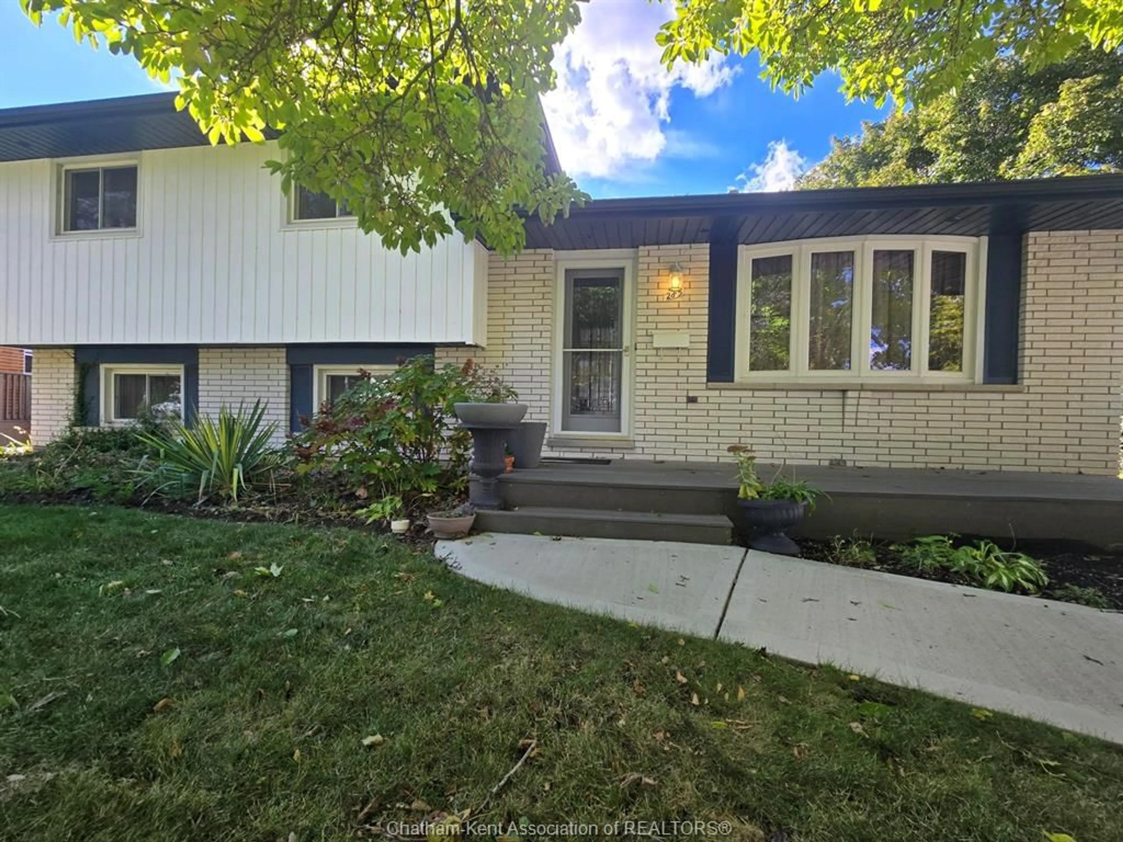 Home with vinyl exterior material, street for 285 Baldoon Rd, Chatham Ontario N7L 1E5