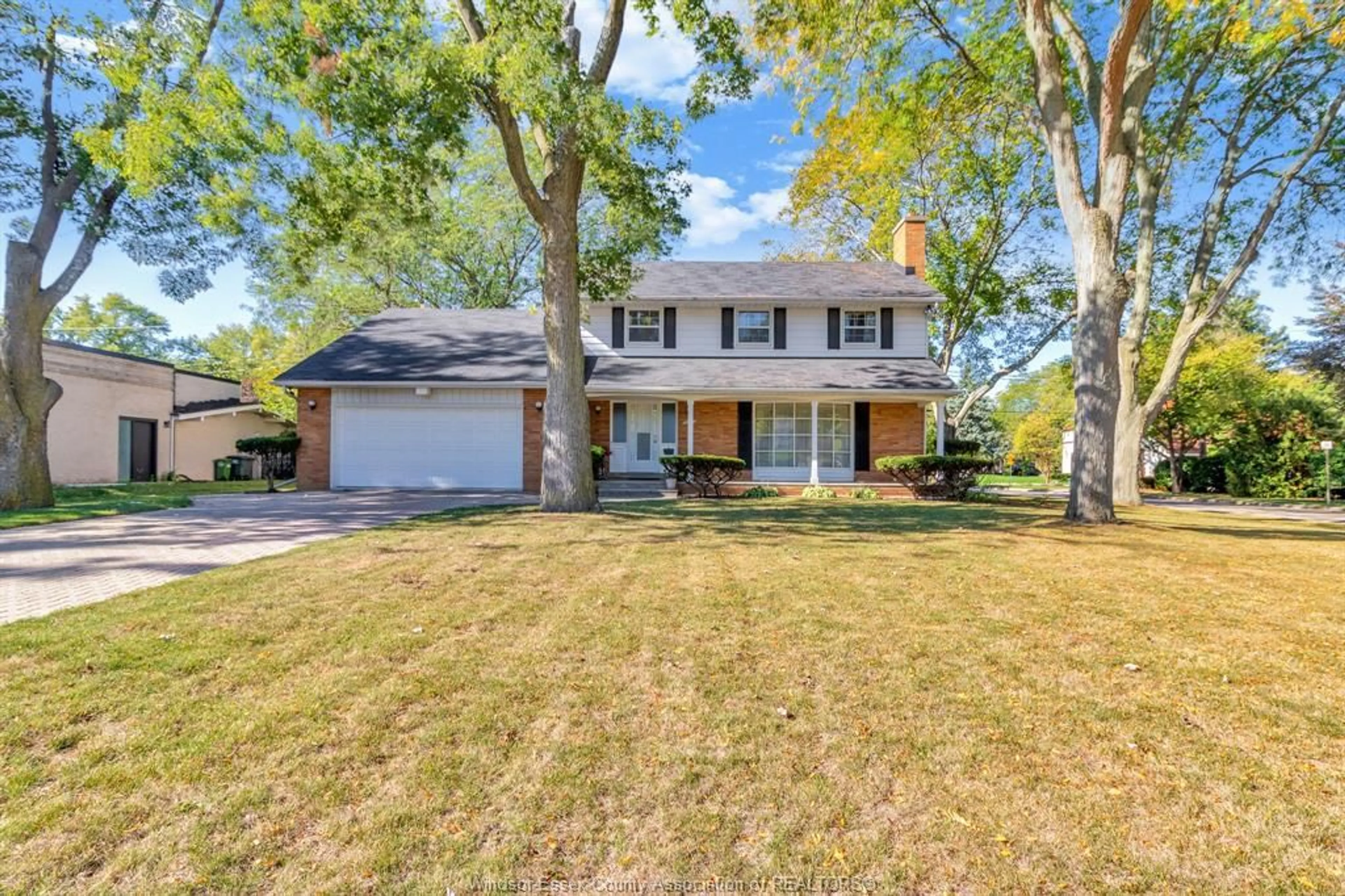 Home with vinyl exterior material, street for 3511 OUELLETTE Ave, Windsor Ontario N9E 3M3