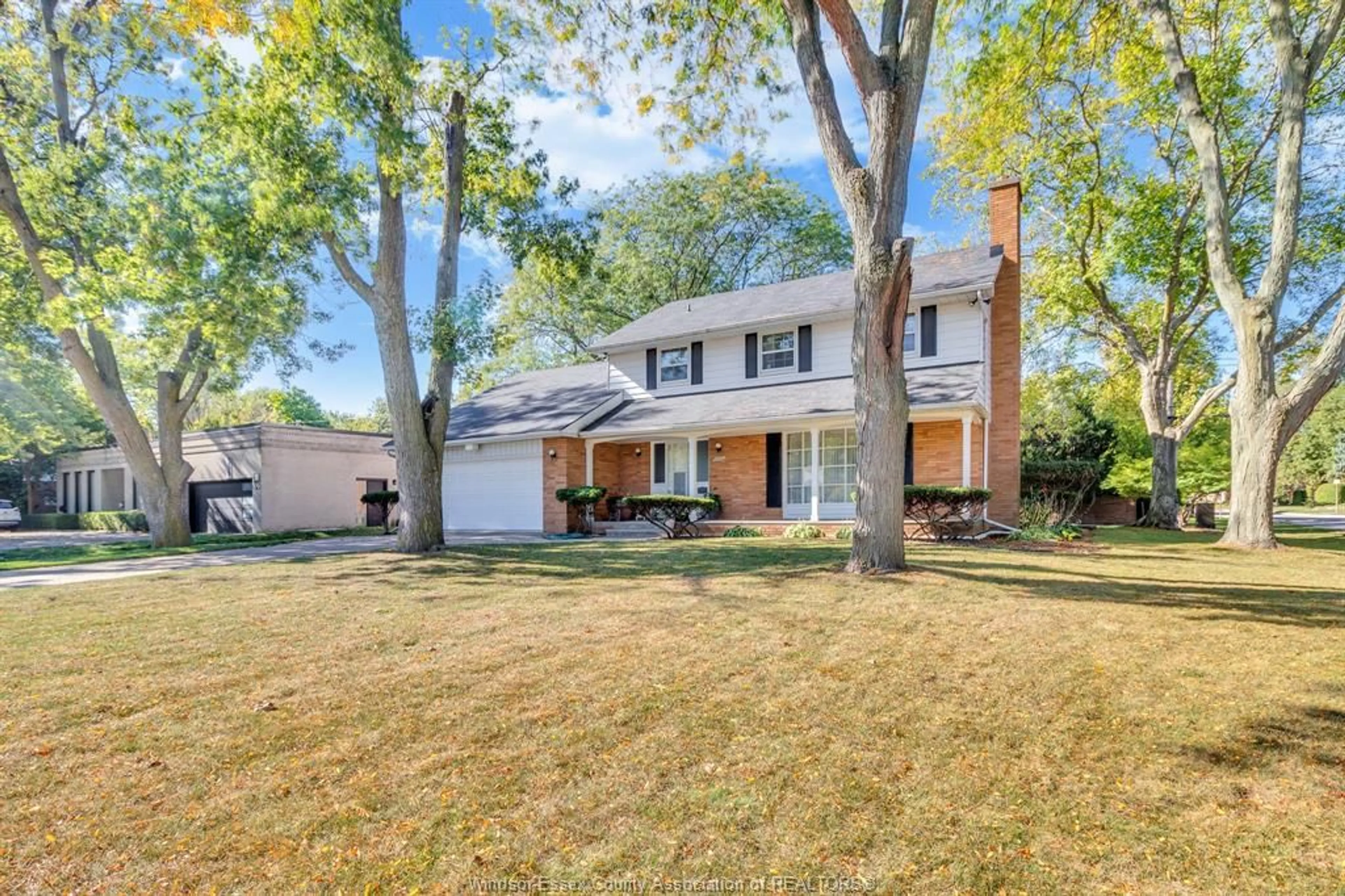 Home with vinyl exterior material, street for 3511 OUELLETTE Ave, Windsor Ontario N9E 3M3