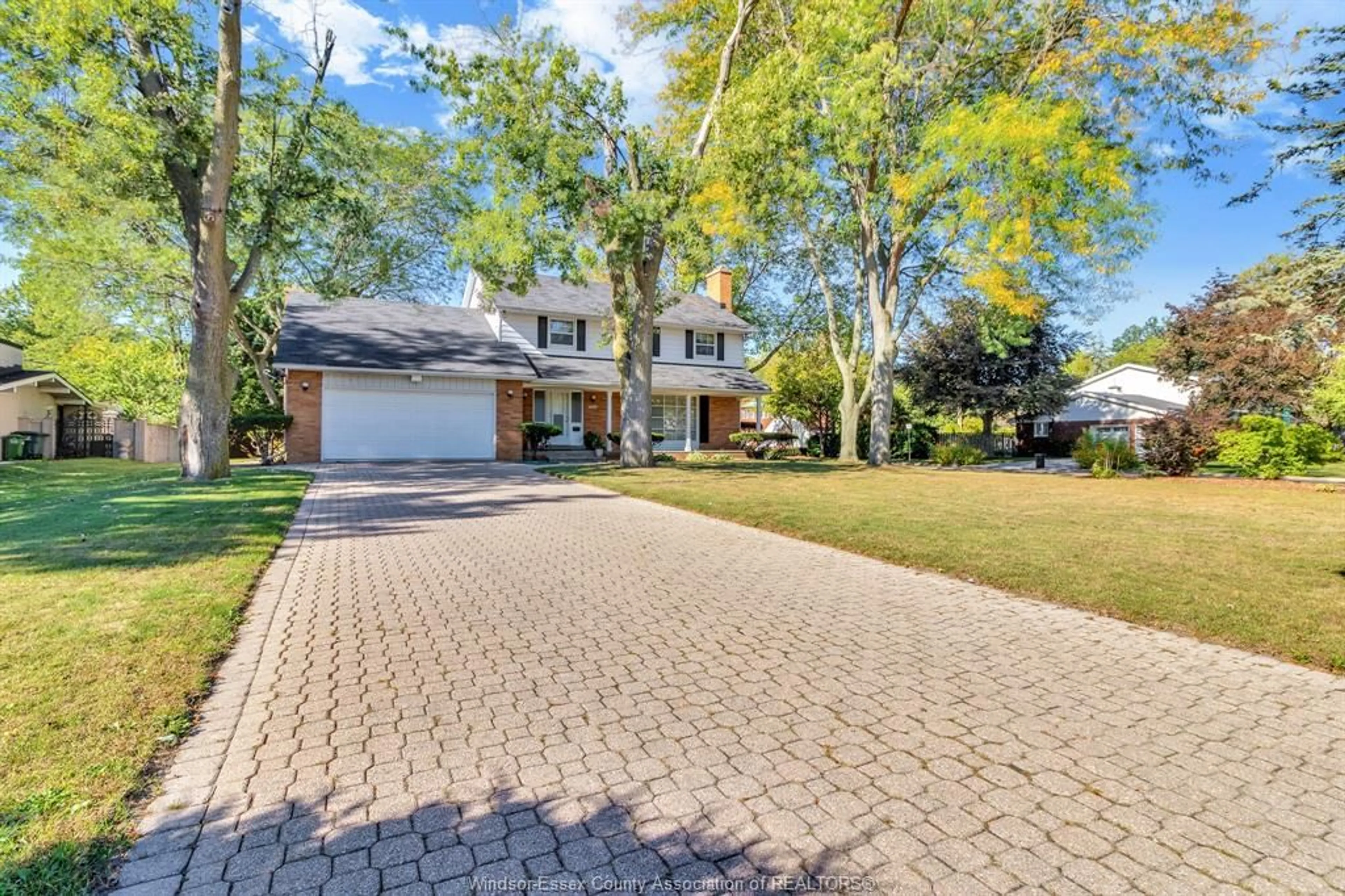 Home with brick exterior material, street for 3511 OUELLETTE Ave, Windsor Ontario N9E 3M3