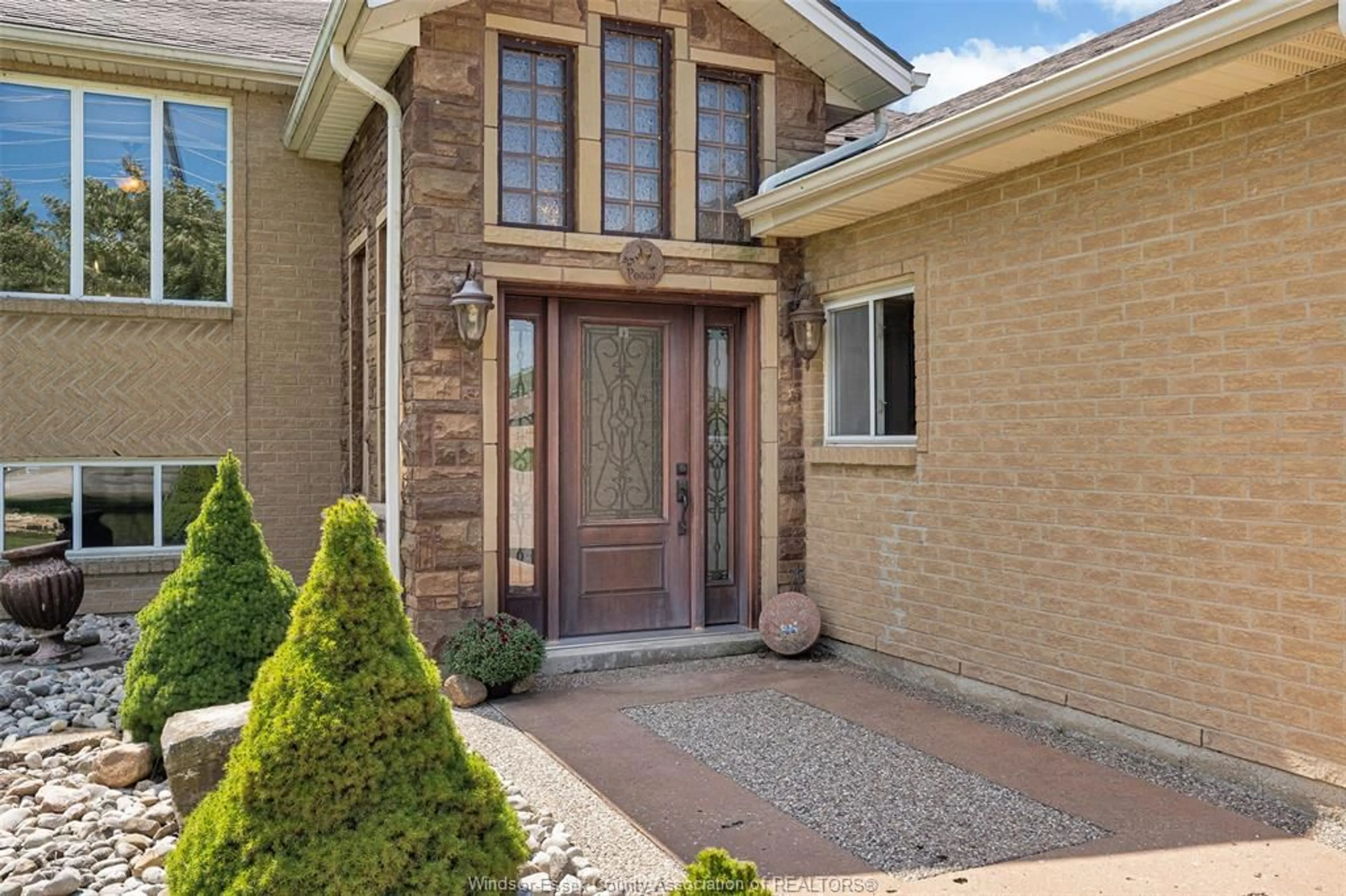 Home with brick exterior material, street for 522 COUNTY RD 8, Leamington Ontario N0P 2J0