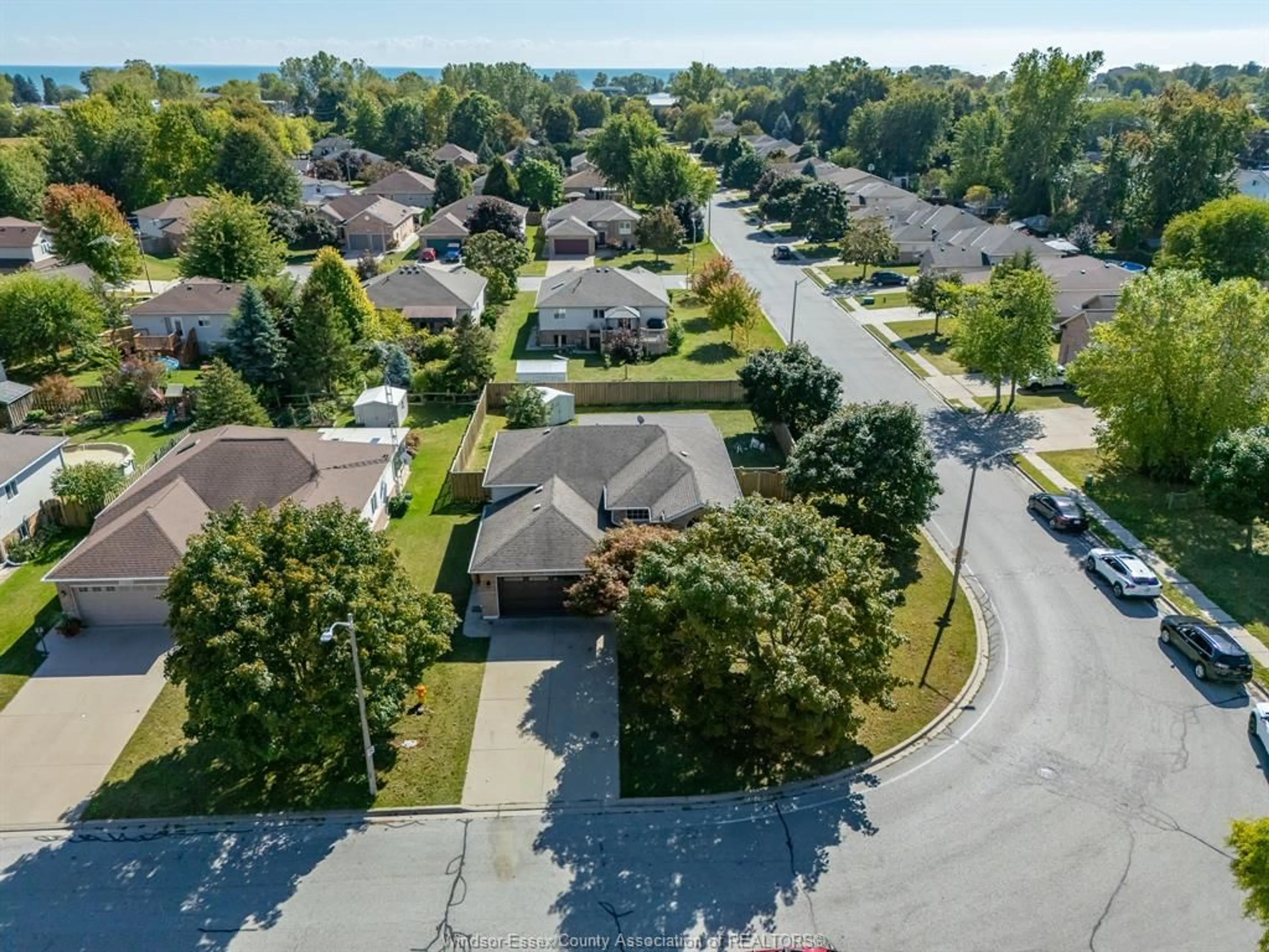 A pic from outside/outdoor area/front of a property/back of a property/a pic from drone, street for 141 Walker Dr, Kingsville Ontario N9Y 3Z6