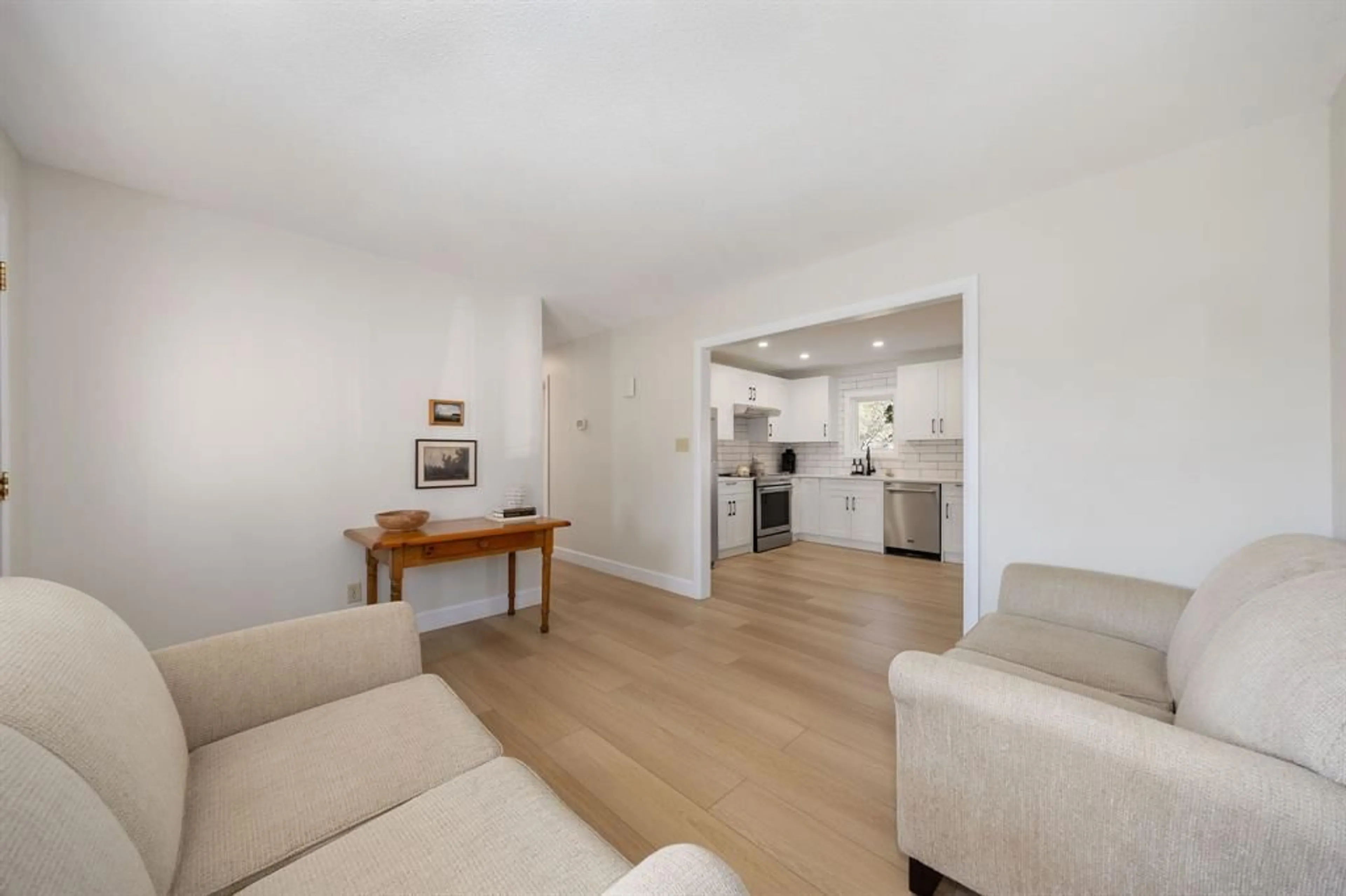 Living room with furniture, wood/laminate floor for 3317 River St, Brooke-Alvinston Ontario N0N 1A0
