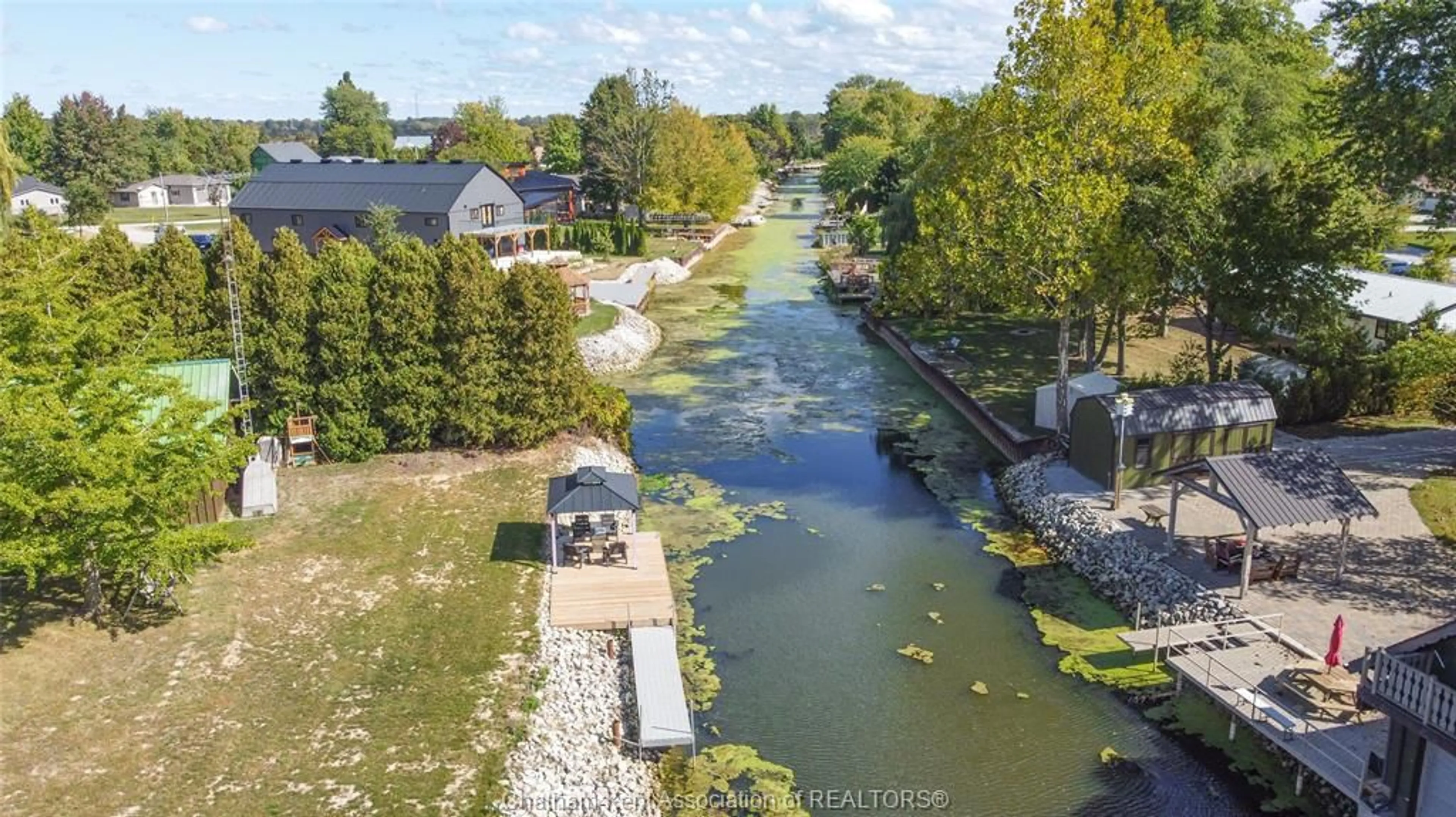 A pic from outside/outdoor area/front of a property/back of a property/a pic from drone, water/lake/river/ocean view for 11280 RONDEAU ESTATES Line, Morpeth Ontario N0P 1X0