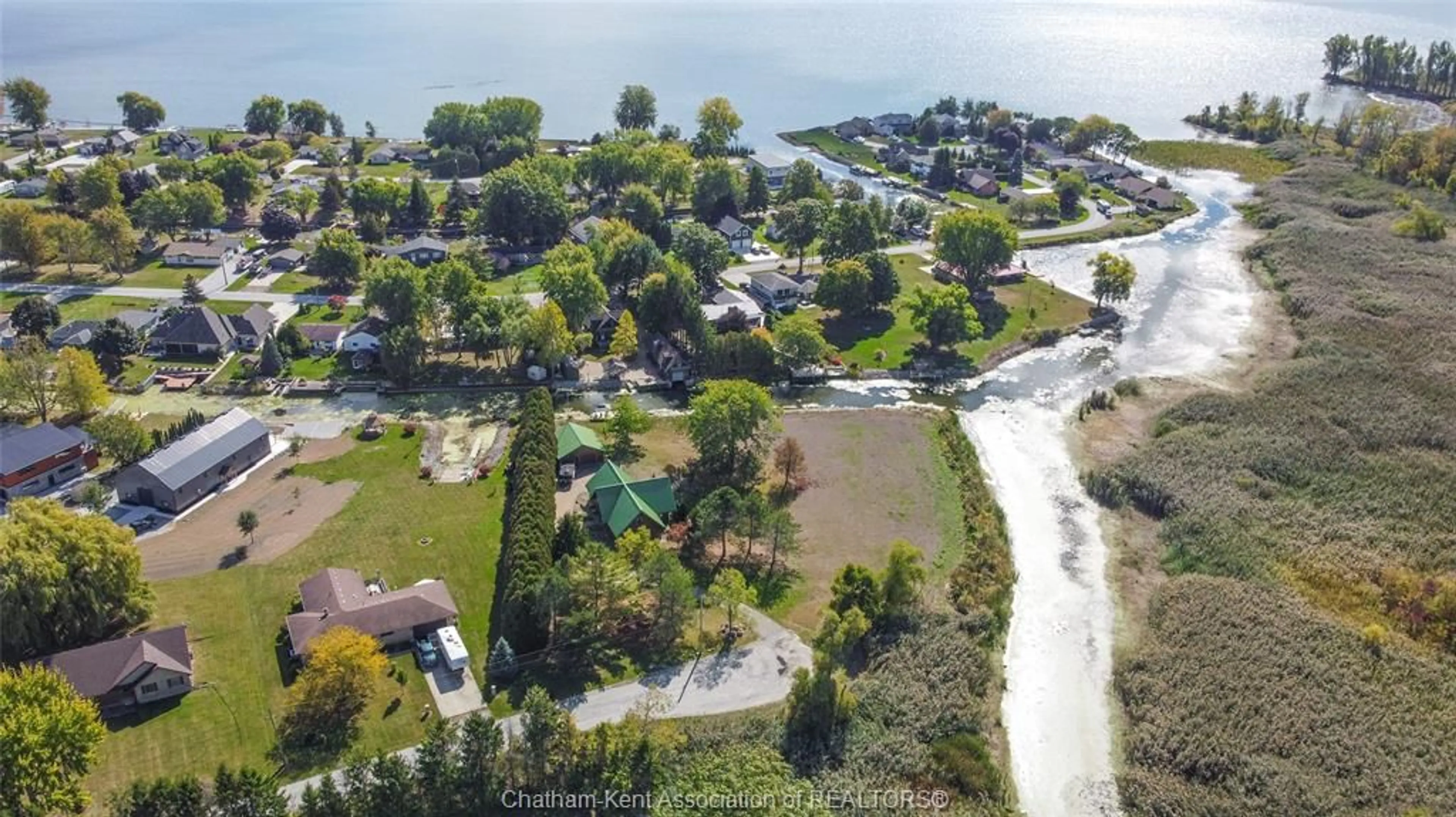 A pic from outside/outdoor area/front of a property/back of a property/a pic from drone, water/lake/river/ocean view for 11280 RONDEAU ESTATES Line, Morpeth Ontario N0P 1X0