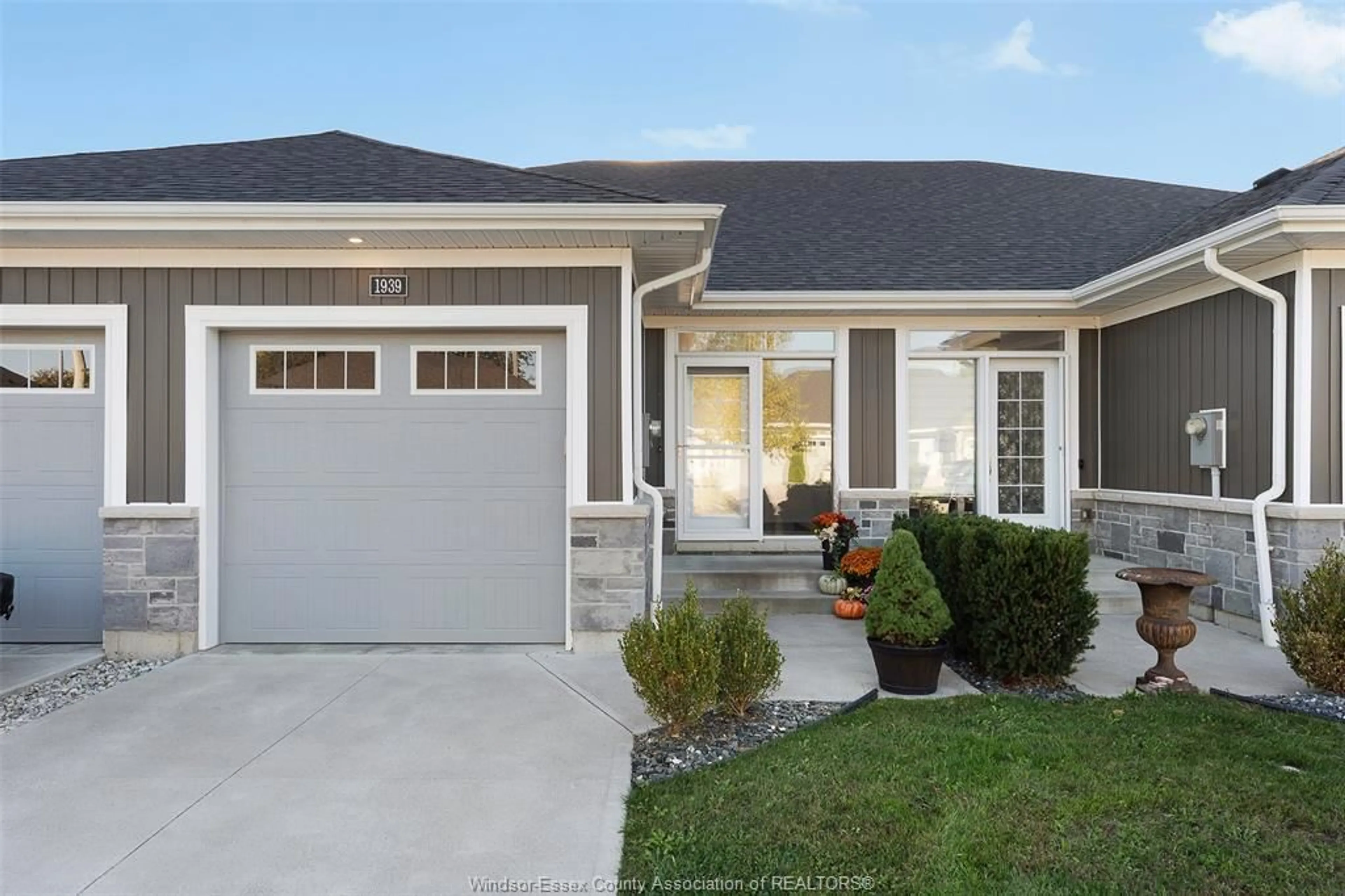 Home with vinyl exterior material, street for 1939 ETHAN Crt, Windsor Ontario N8T 1G1