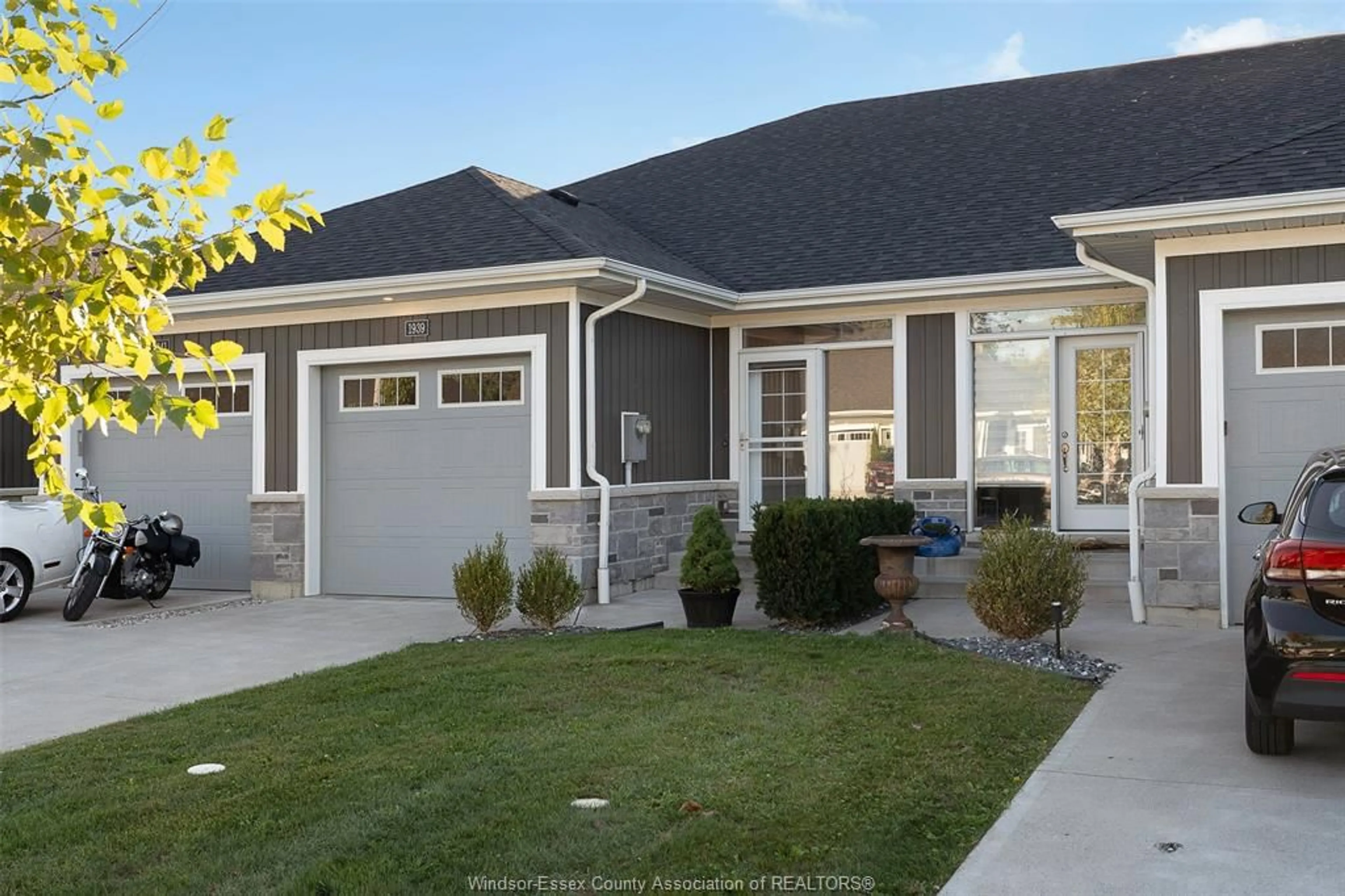 Home with vinyl exterior material, street for 1939 ETHAN Crt, Windsor Ontario N8T 1G1