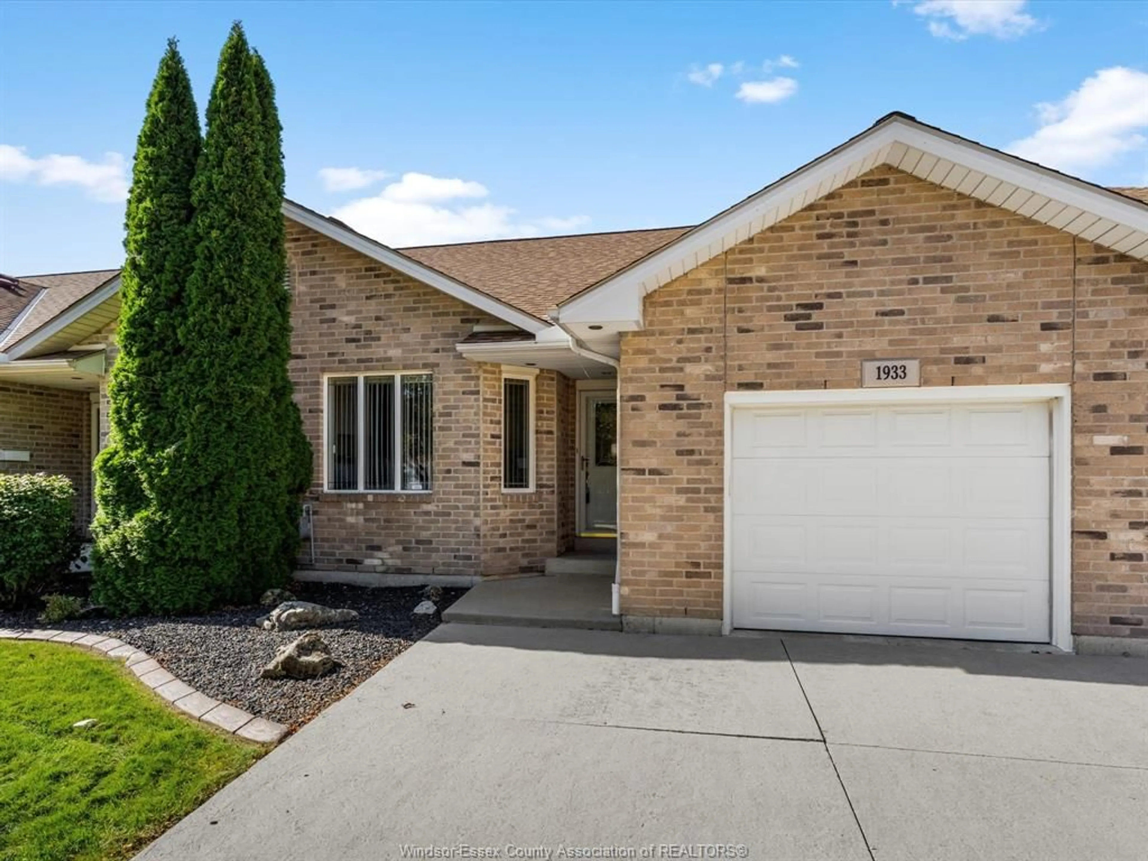 Home with brick exterior material, street for 1933 Morningstar Ave, Windsor Ontario N8P 1W6