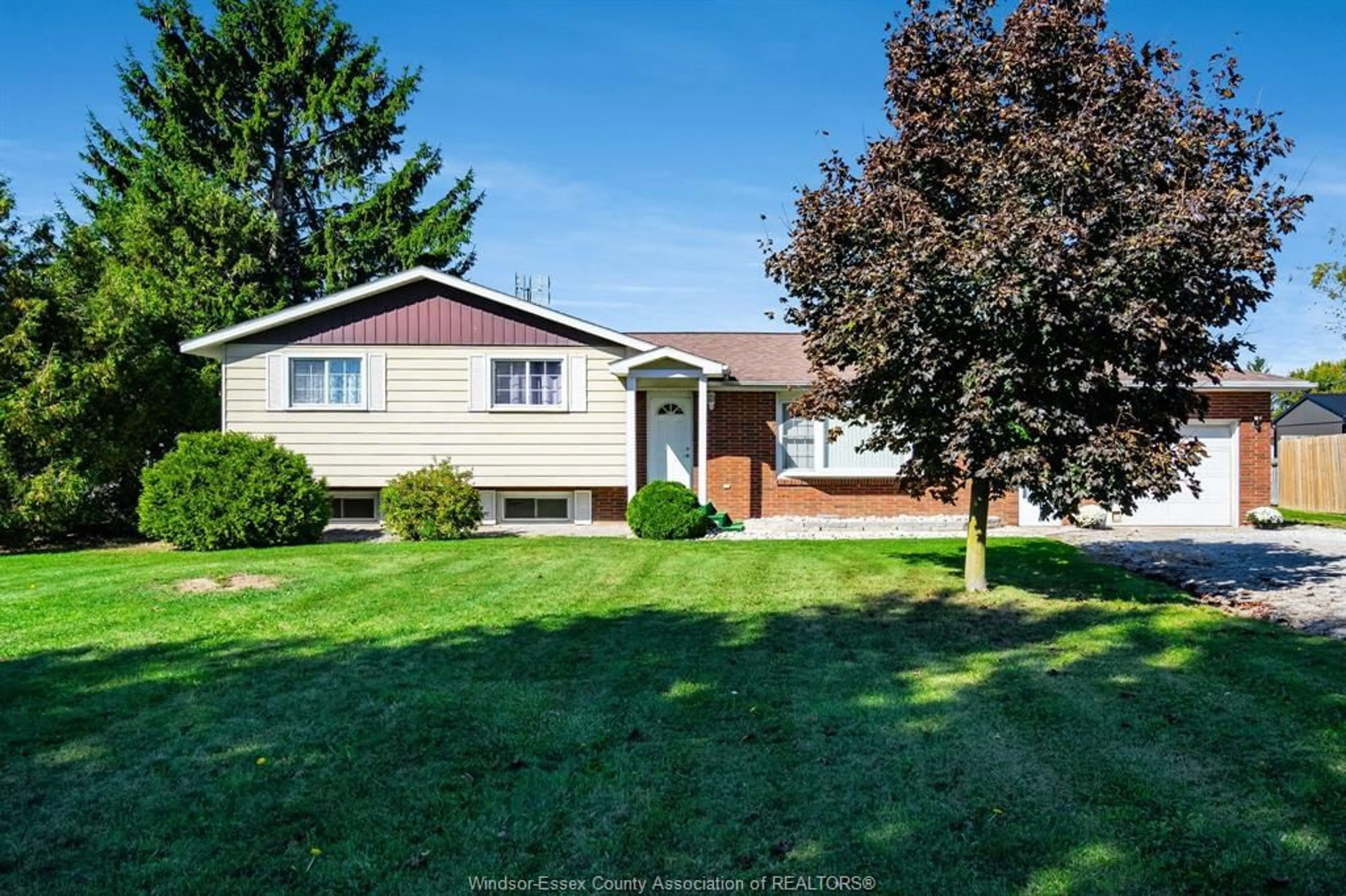 Home with vinyl exterior material, street for 1 County Rd 29, Kingsville Ontario N0R 1B0