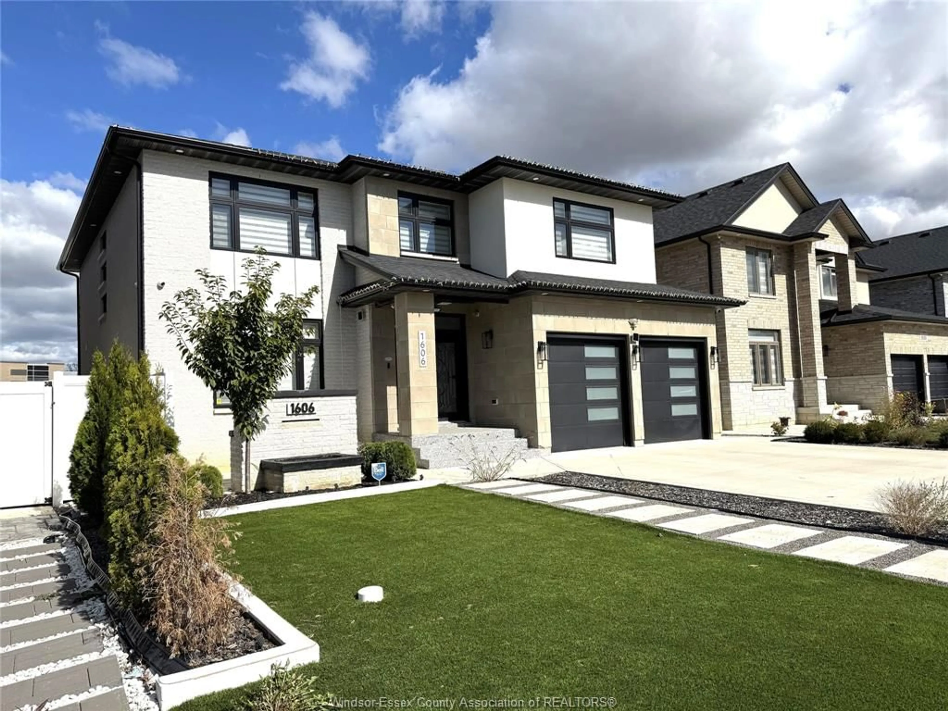 Home with vinyl exterior material, street for 1606 ROCKPORT St, Windsor Ontario N9E 0B2