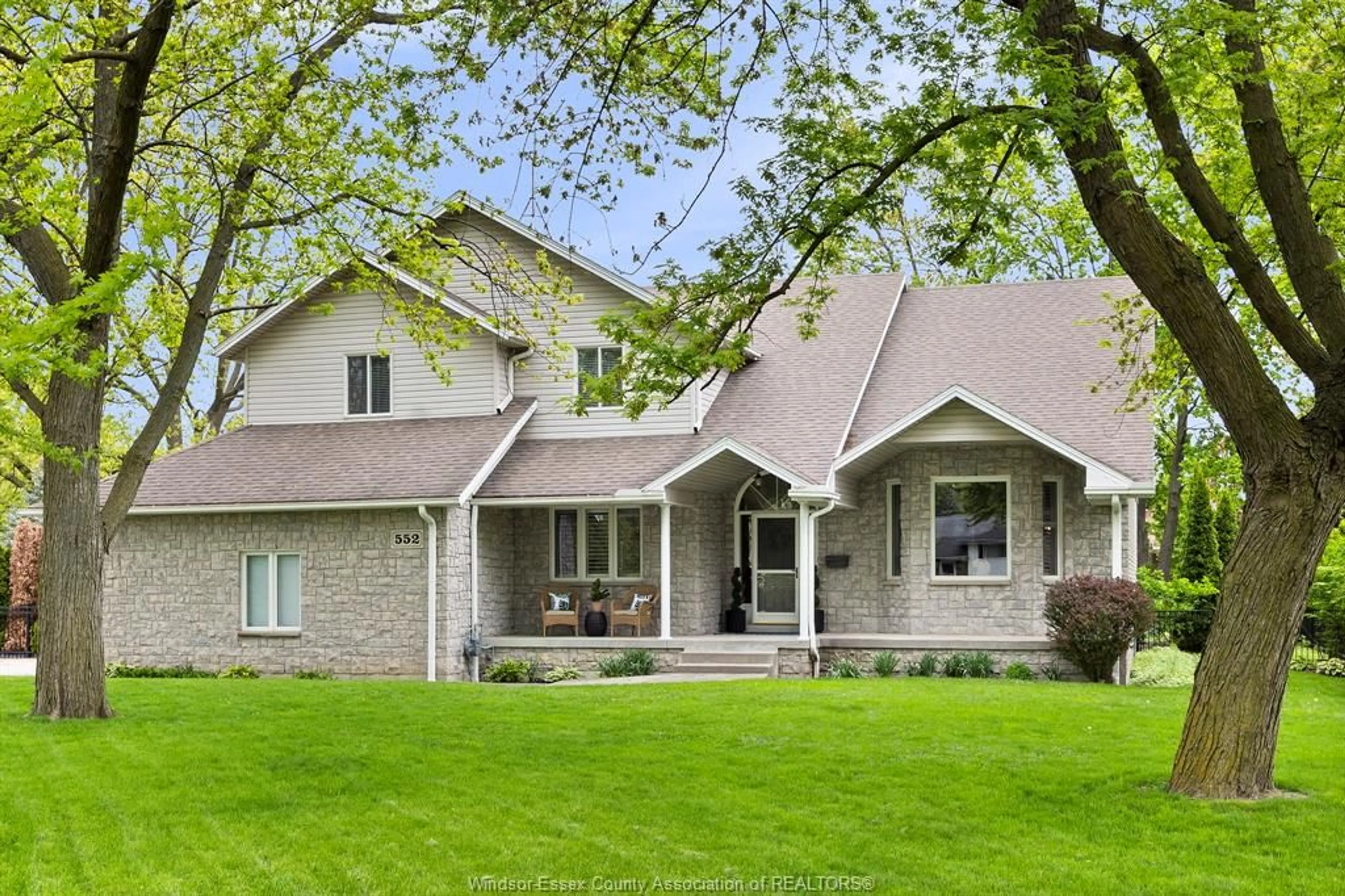 Home with brick exterior material, street for 552 OLD TECUMSEH Rd, Lakeshore Ontario N0R 1A0