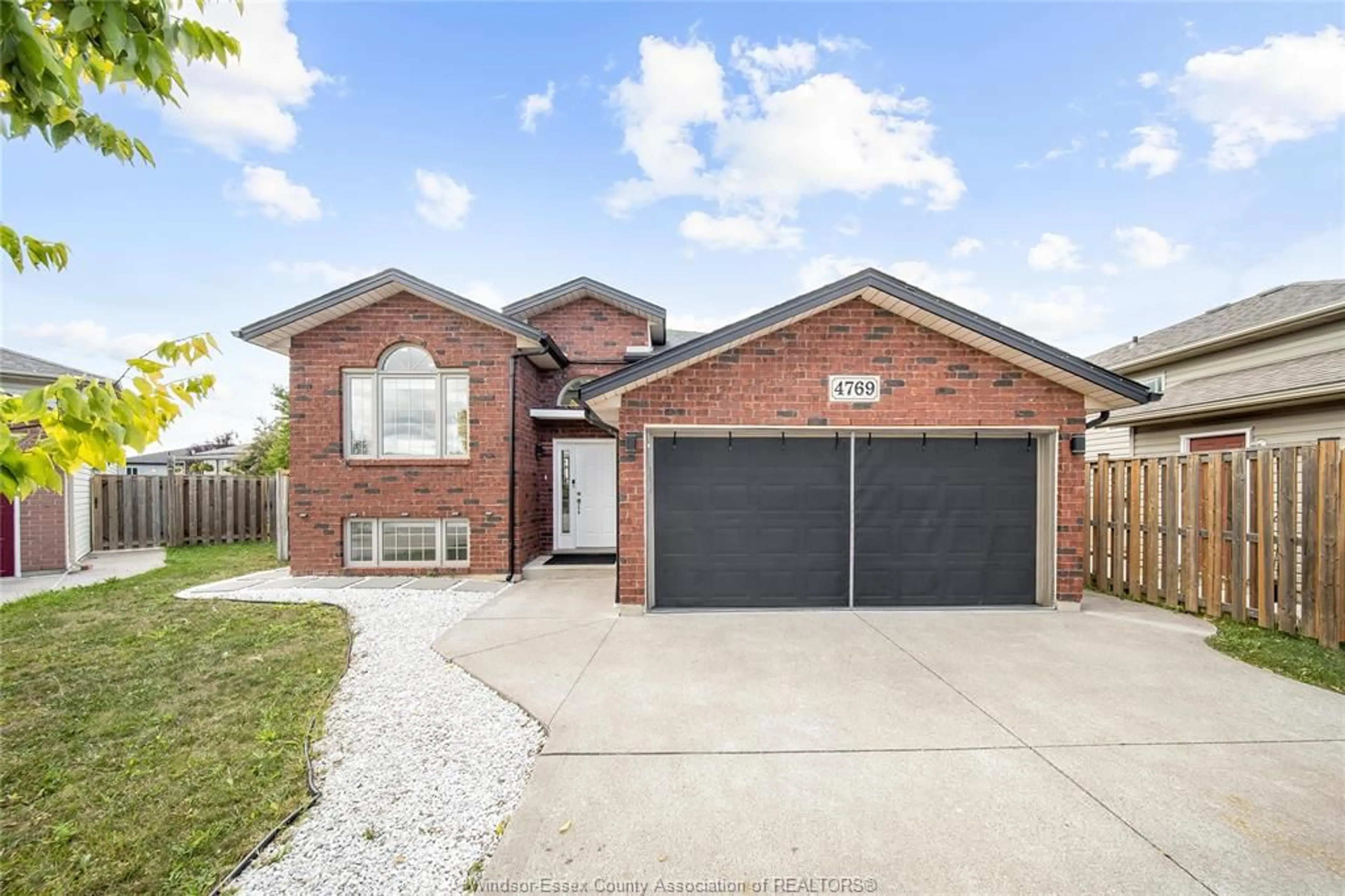 Home with brick exterior material, street for 4769 JULIET Cres, Windsor Ontario N9G 3A7