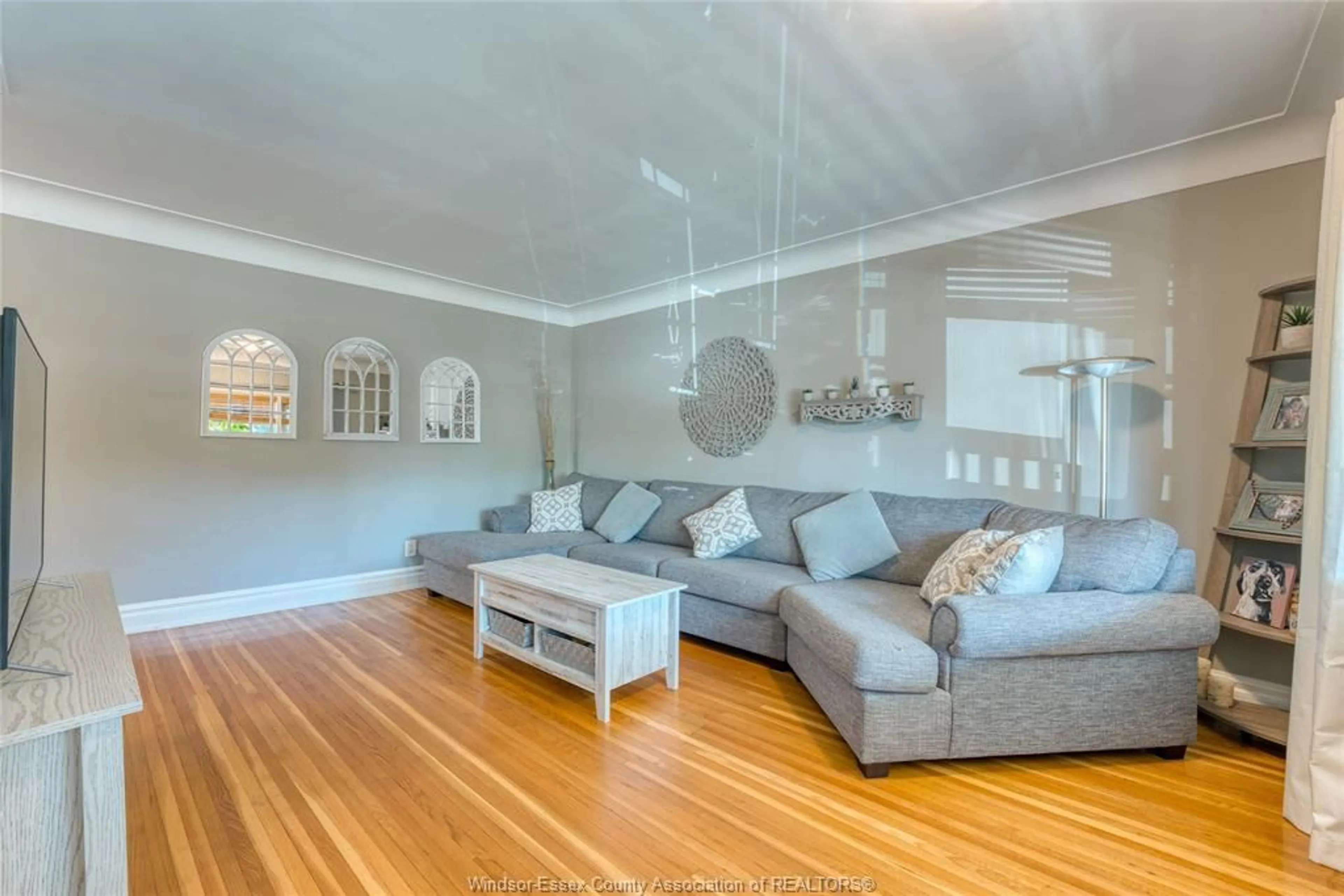 Living room with furniture, wood/laminate floor for 2837 JOS ST LOUIS, Windsor Ontario N8T 2M7