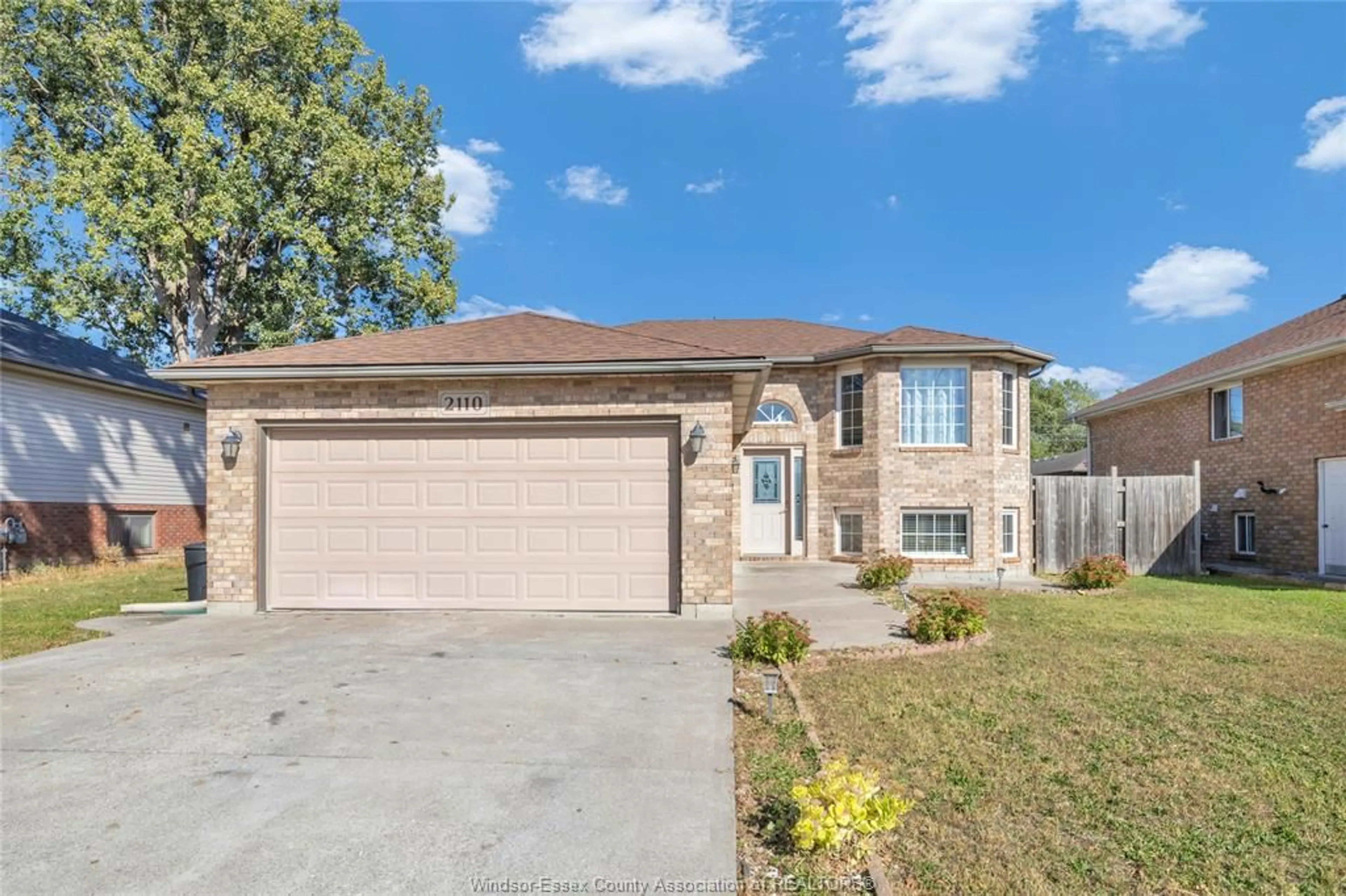 Home with brick exterior material, street for 2110 Dominion, Windsor Ontario N9B 3H9