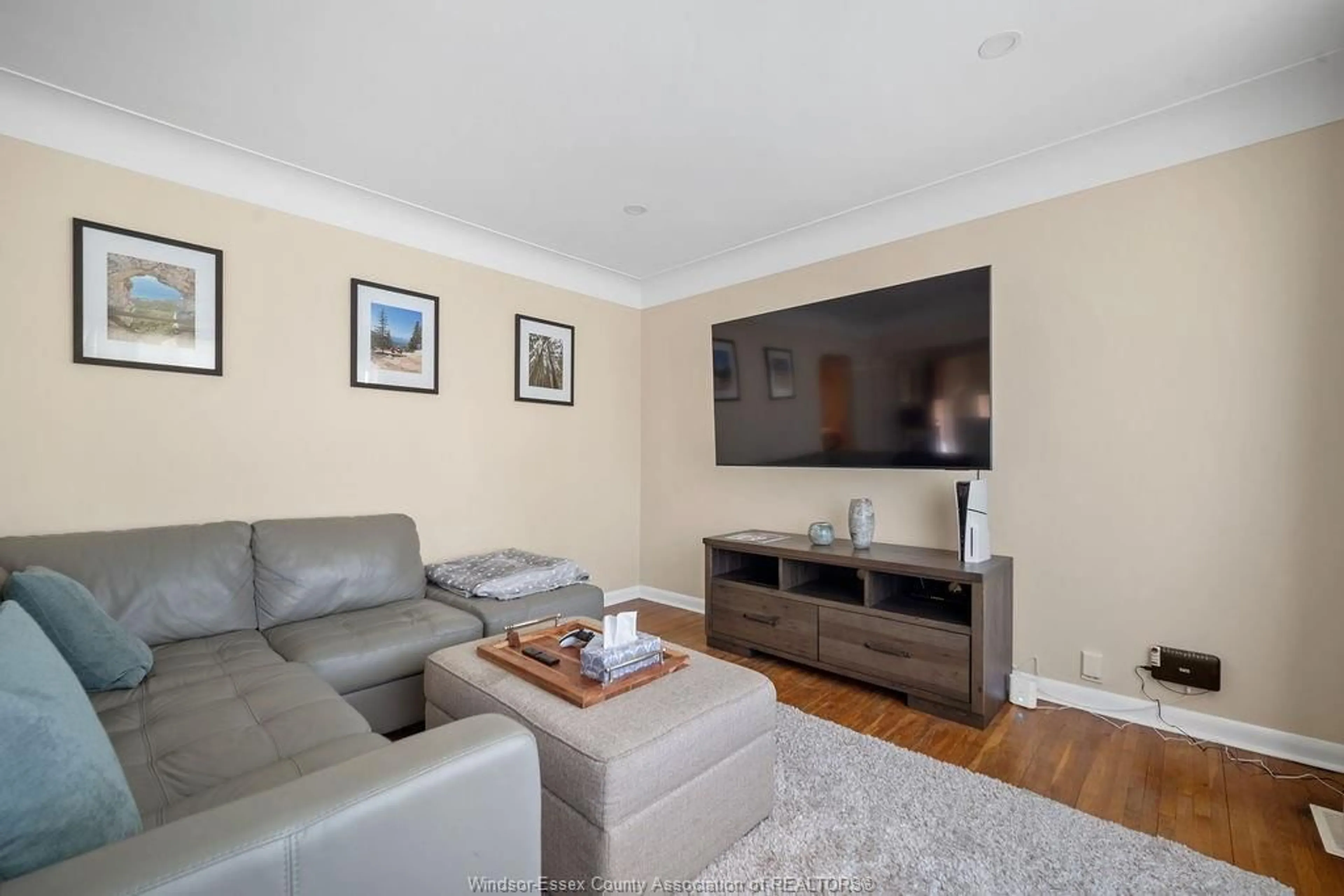 Living room with furniture, wood/laminate floor for 1175 REEDMERE Ave, Windsor Ontario N8S 2M2
