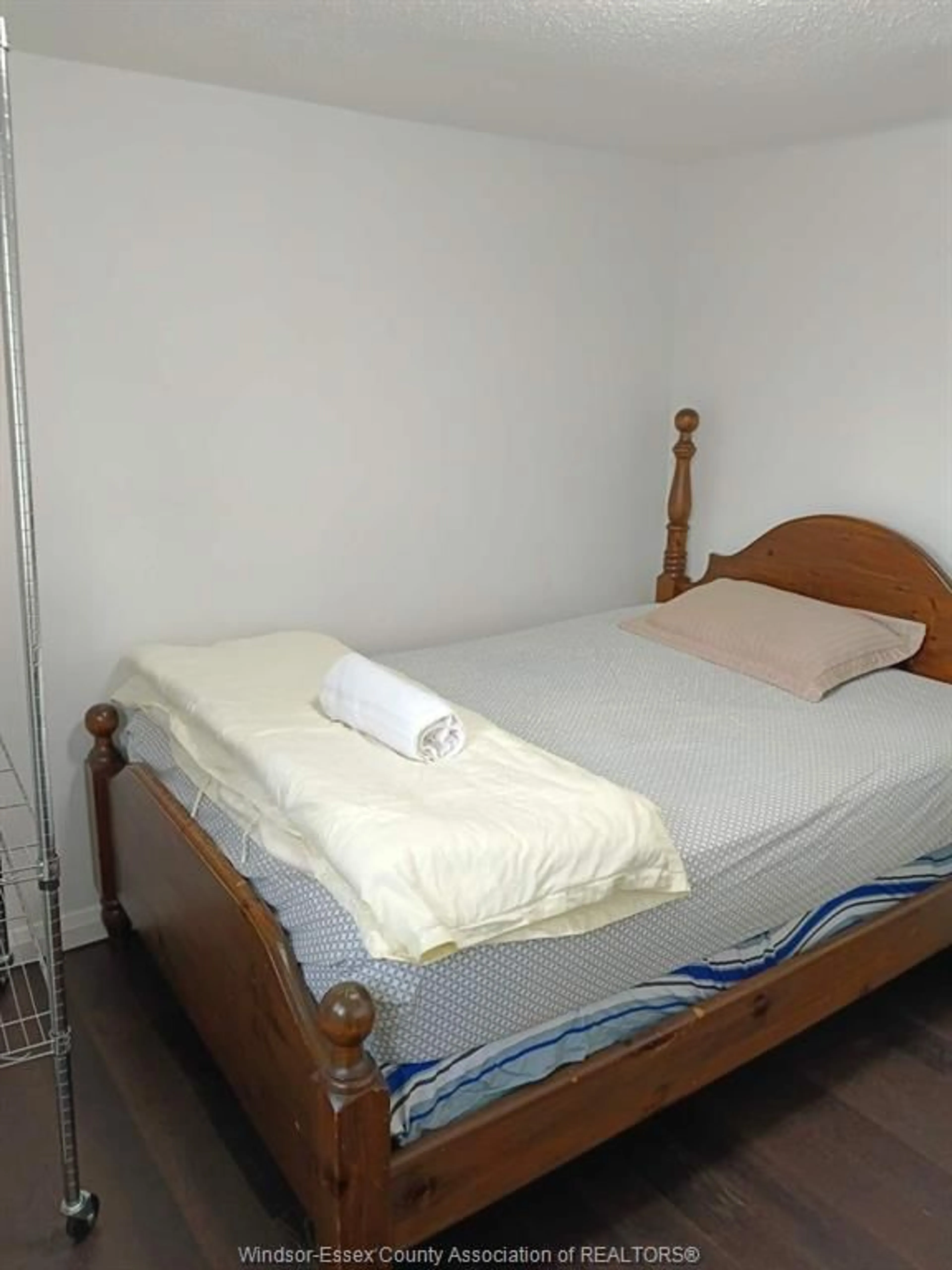Bedroom with bed, floor is not visible for 345 BRIDGE Ave, Windsor Ontario N9B 2M3