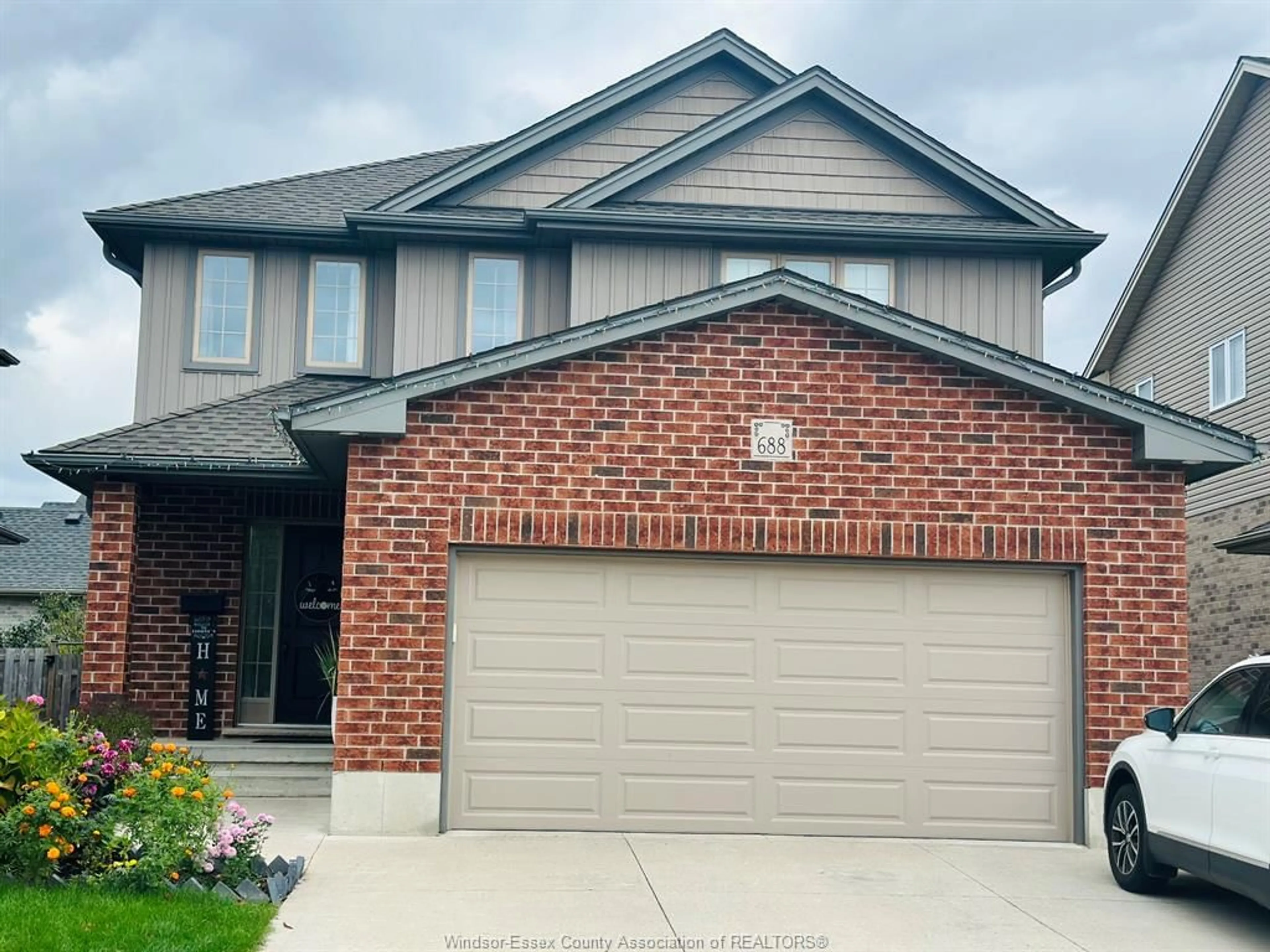 Home with brick exterior material, street for 688 HALIFAX Rd, Woodstock Ontario N4T 0G1