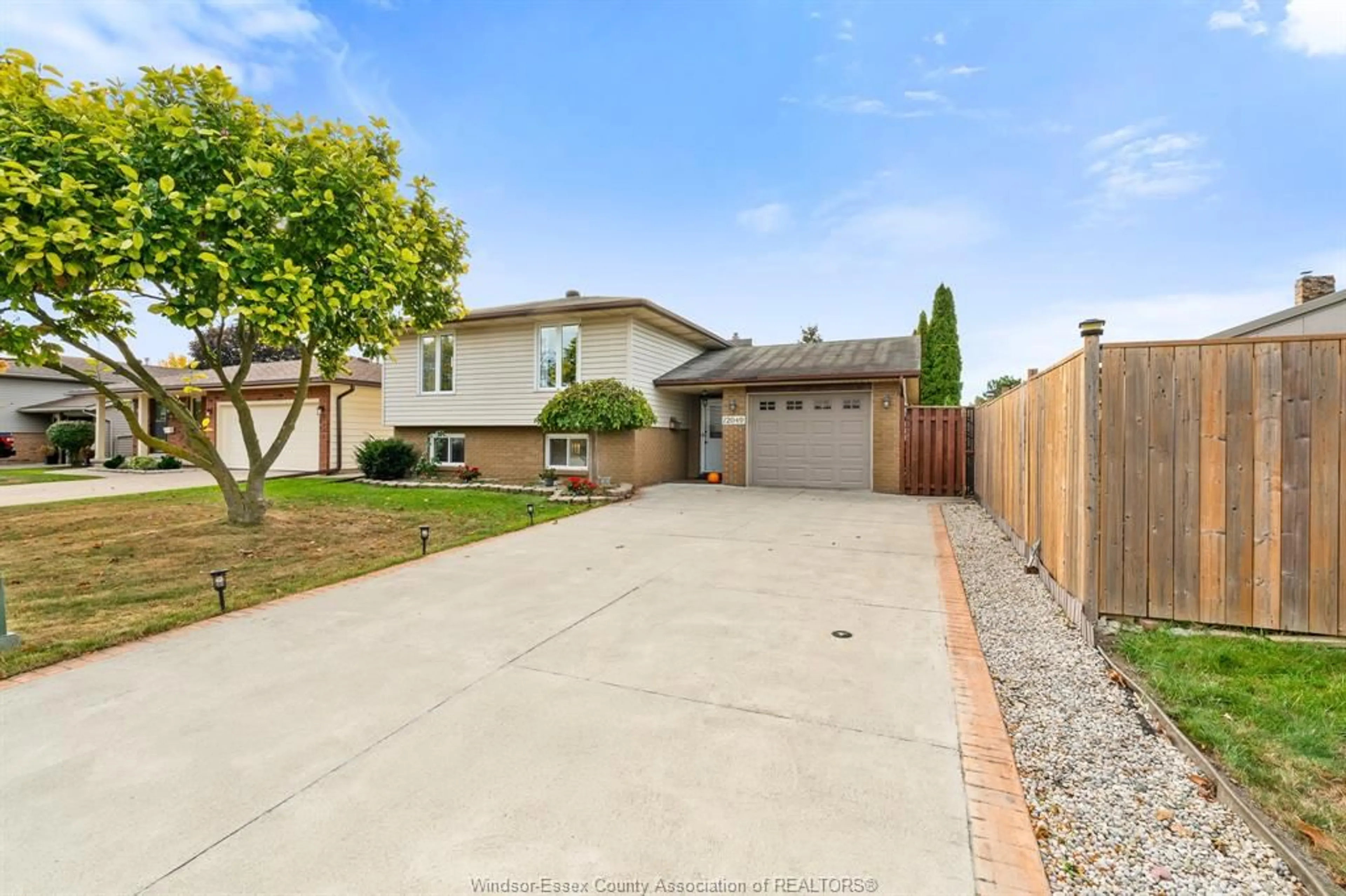 A pic from outside/outdoor area/front of a property/back of a property/a pic from drone, street for 12049 ORCHARD Dr, Tecumseh Ontario N8N 4A1