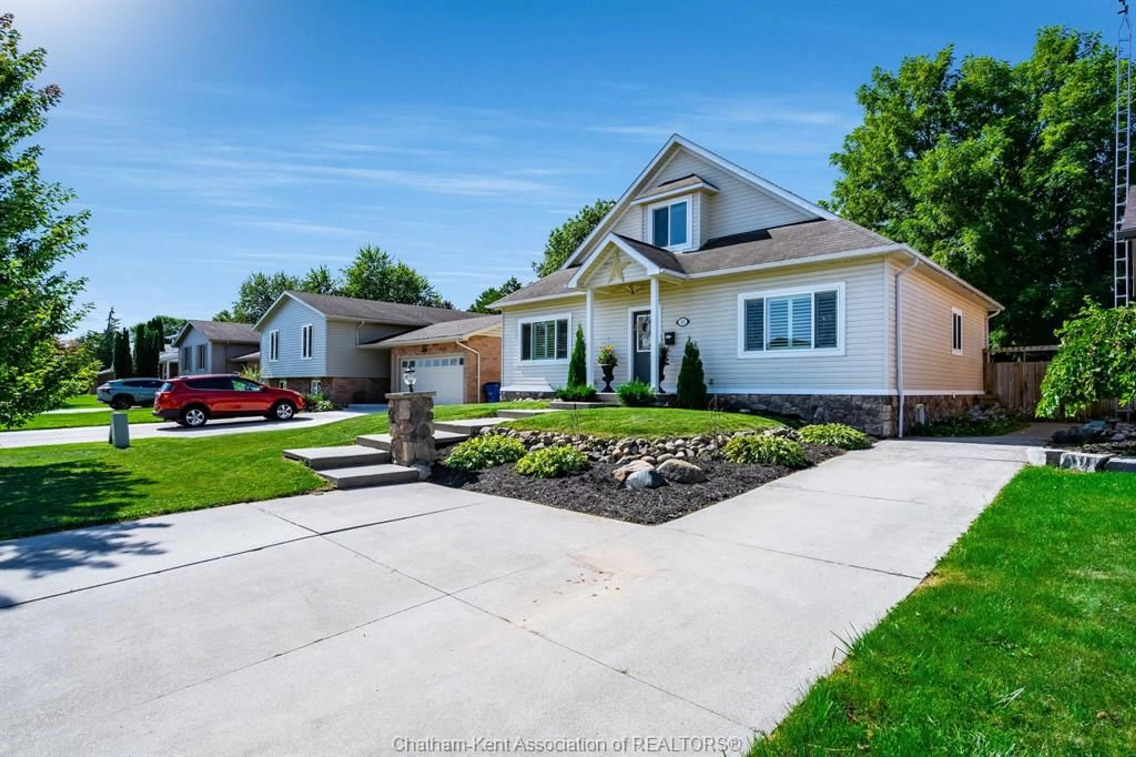 Home with vinyl exterior material, street for 42 Bruinsma Ave, Chatham Ontario N7M 6C3