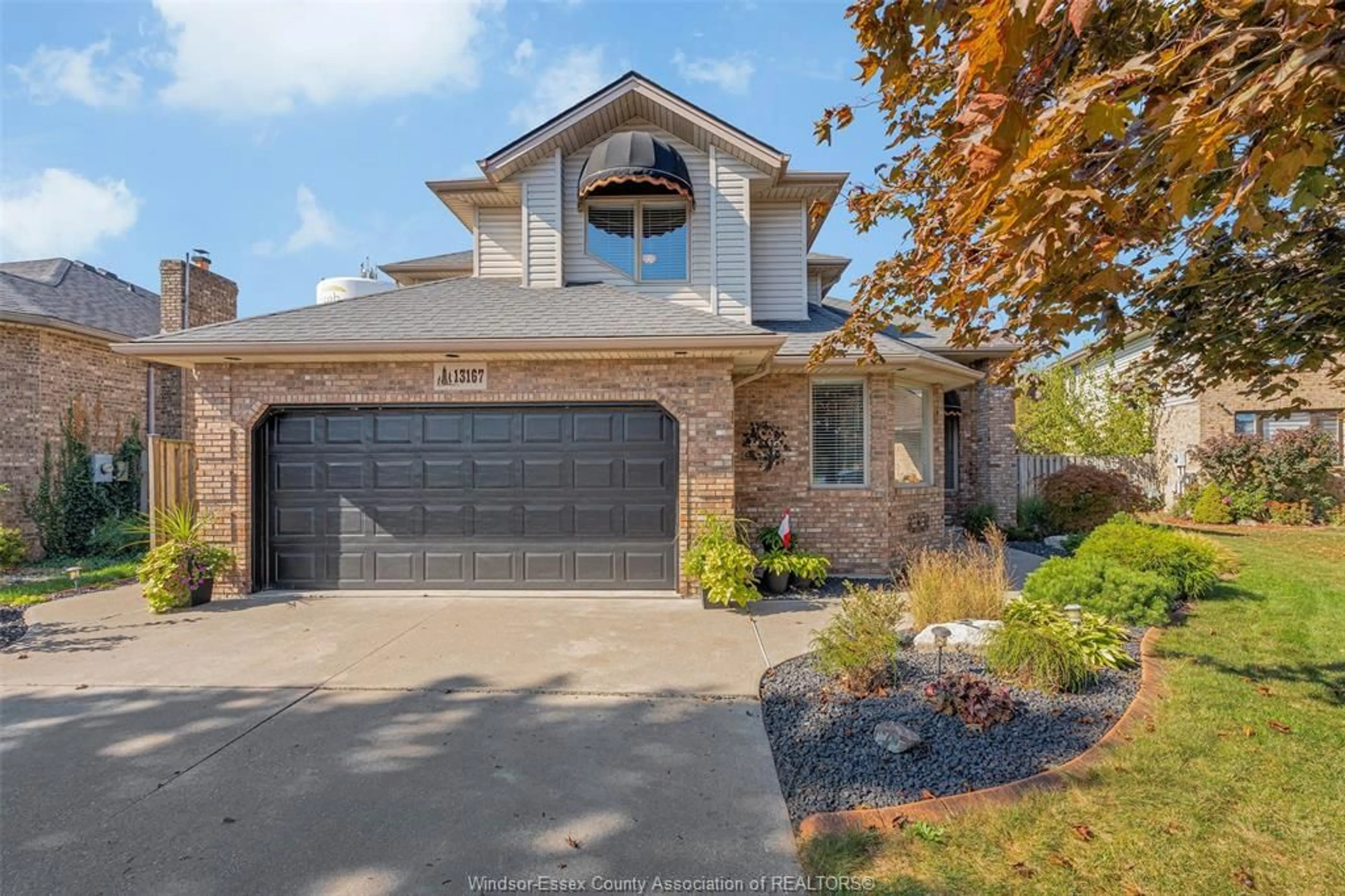 Home with brick exterior material, street for 13167 HARVEST Lane, Tecumseh Ontario N8N 4N7