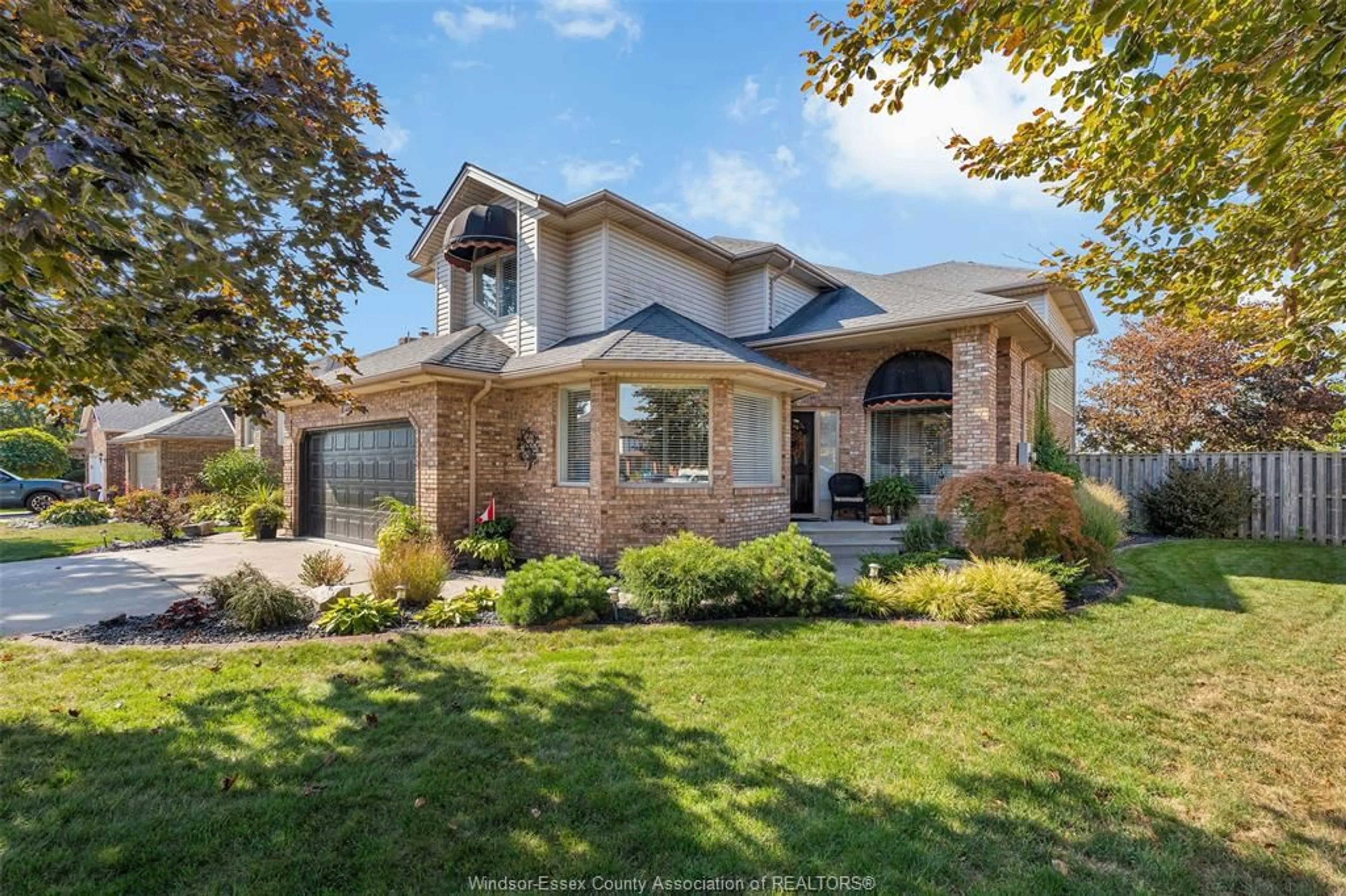 Home with brick exterior material, street for 13167 HARVEST Lane, Tecumseh Ontario N8N 4N7