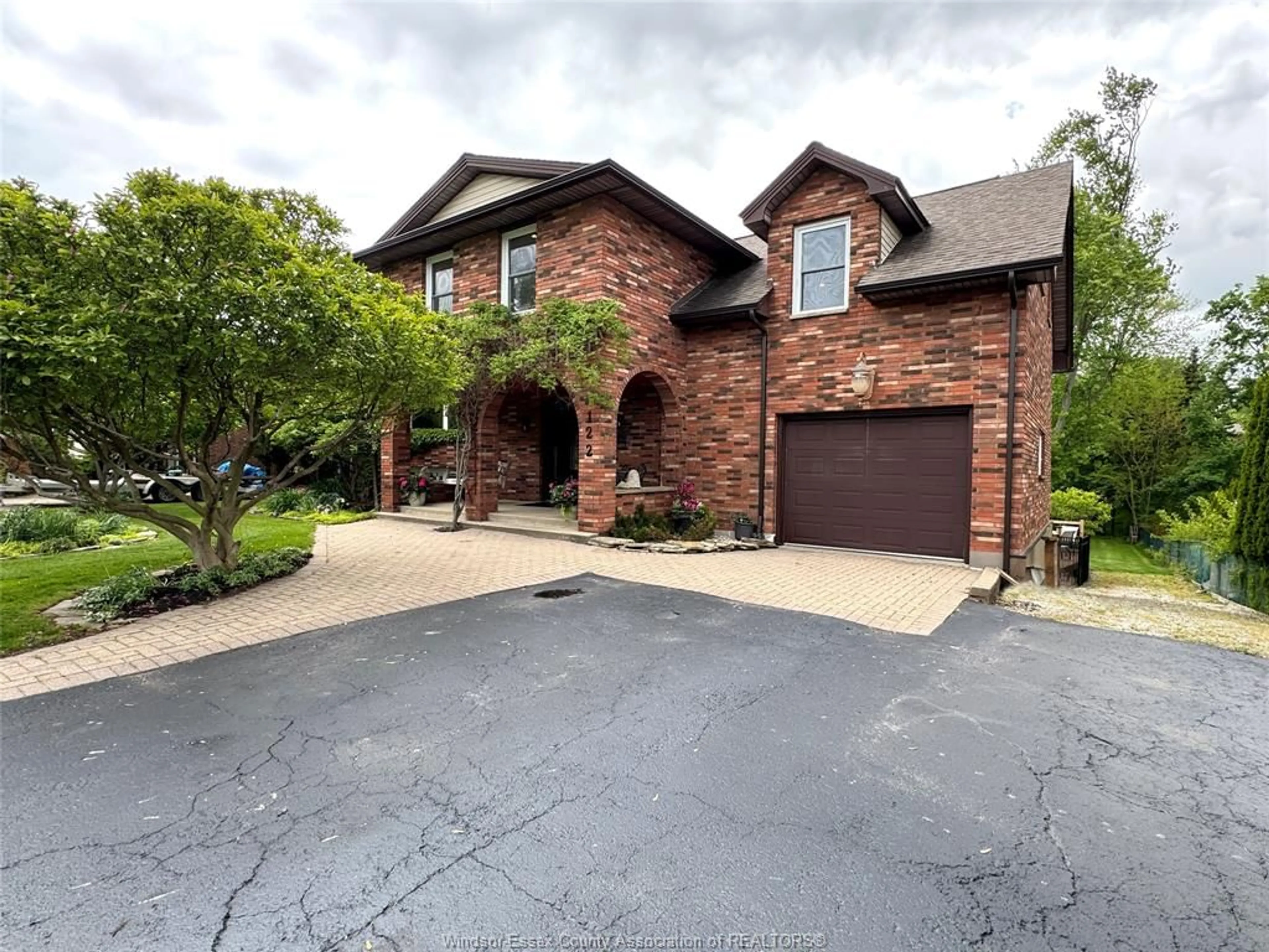 Home with brick exterior material, street for 122 AUGUSTINE Dr, Kingsville Ontario N9W 1C5