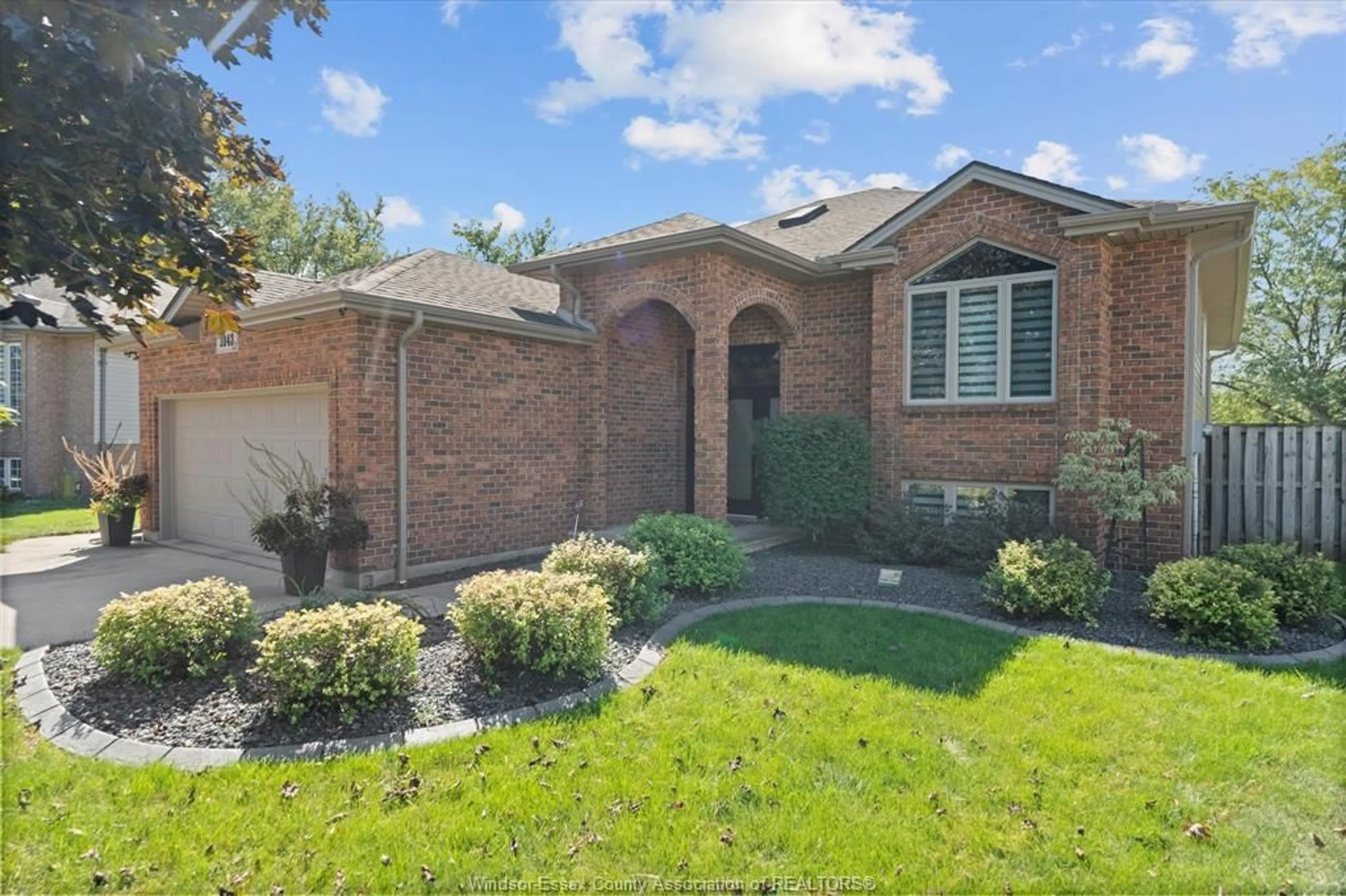 Home with brick exterior material, street for 1043 SOCRATES Cres, Windsor Ontario N9G 2P2