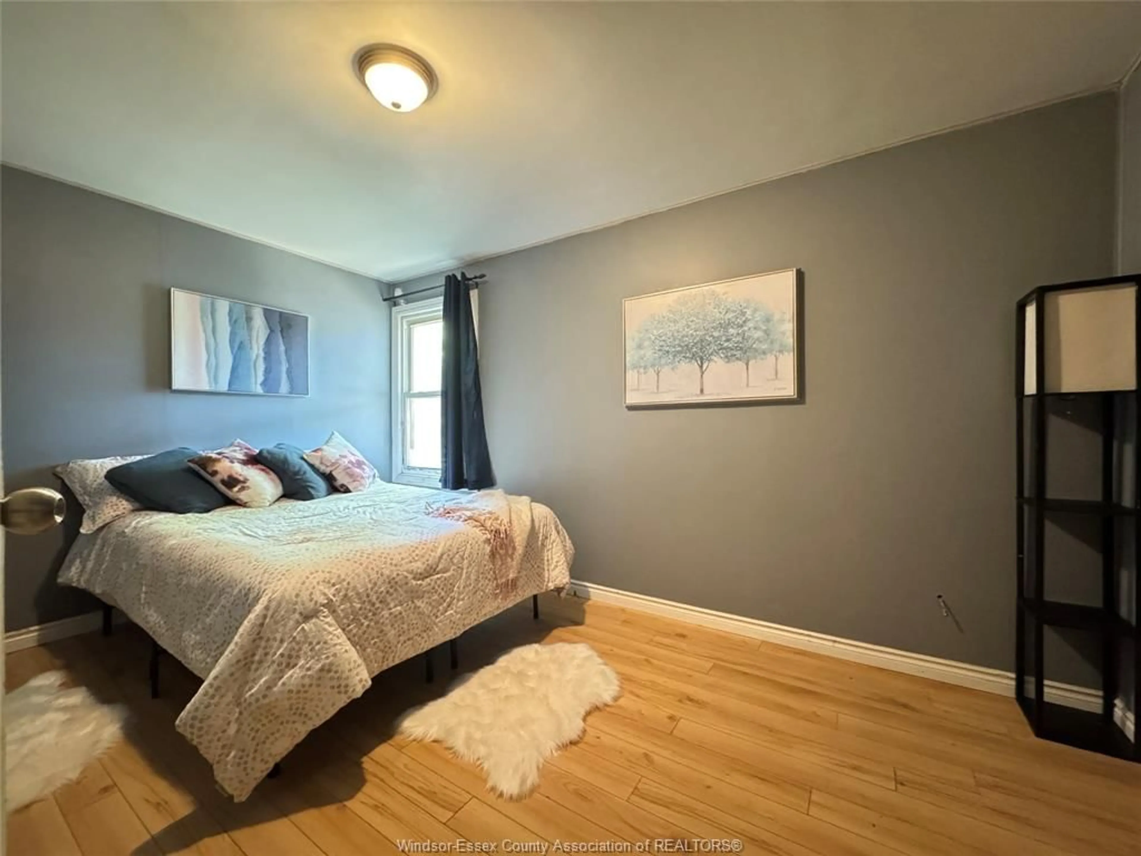 Bedroom with bed, wood/laminate floor for 255 ELLIOTT, Windsor Ontario N9A 3R7