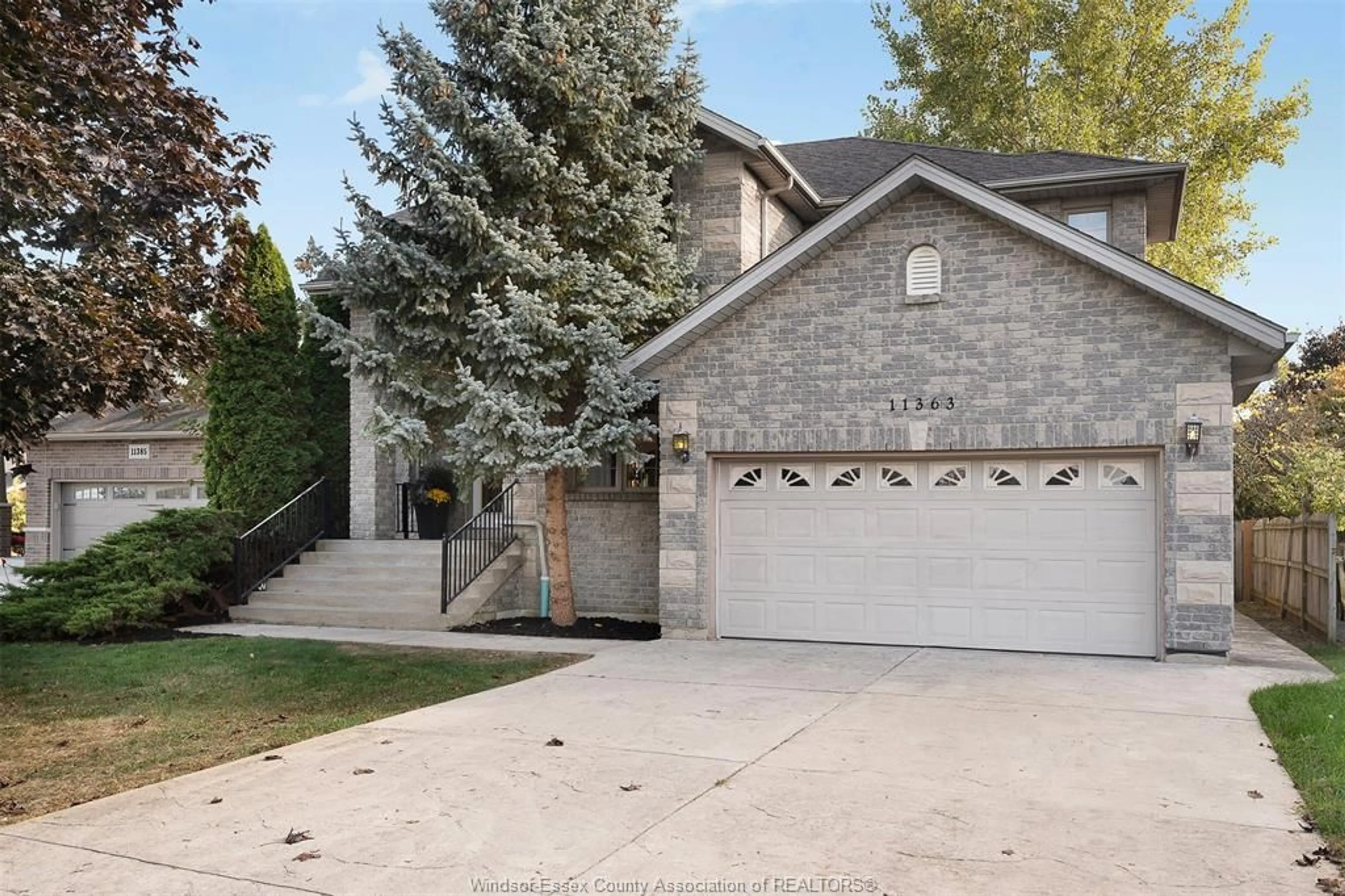 Home with brick exterior material, street for 11363 AMALFI Dr, Windsor Ontario N8P 1J8