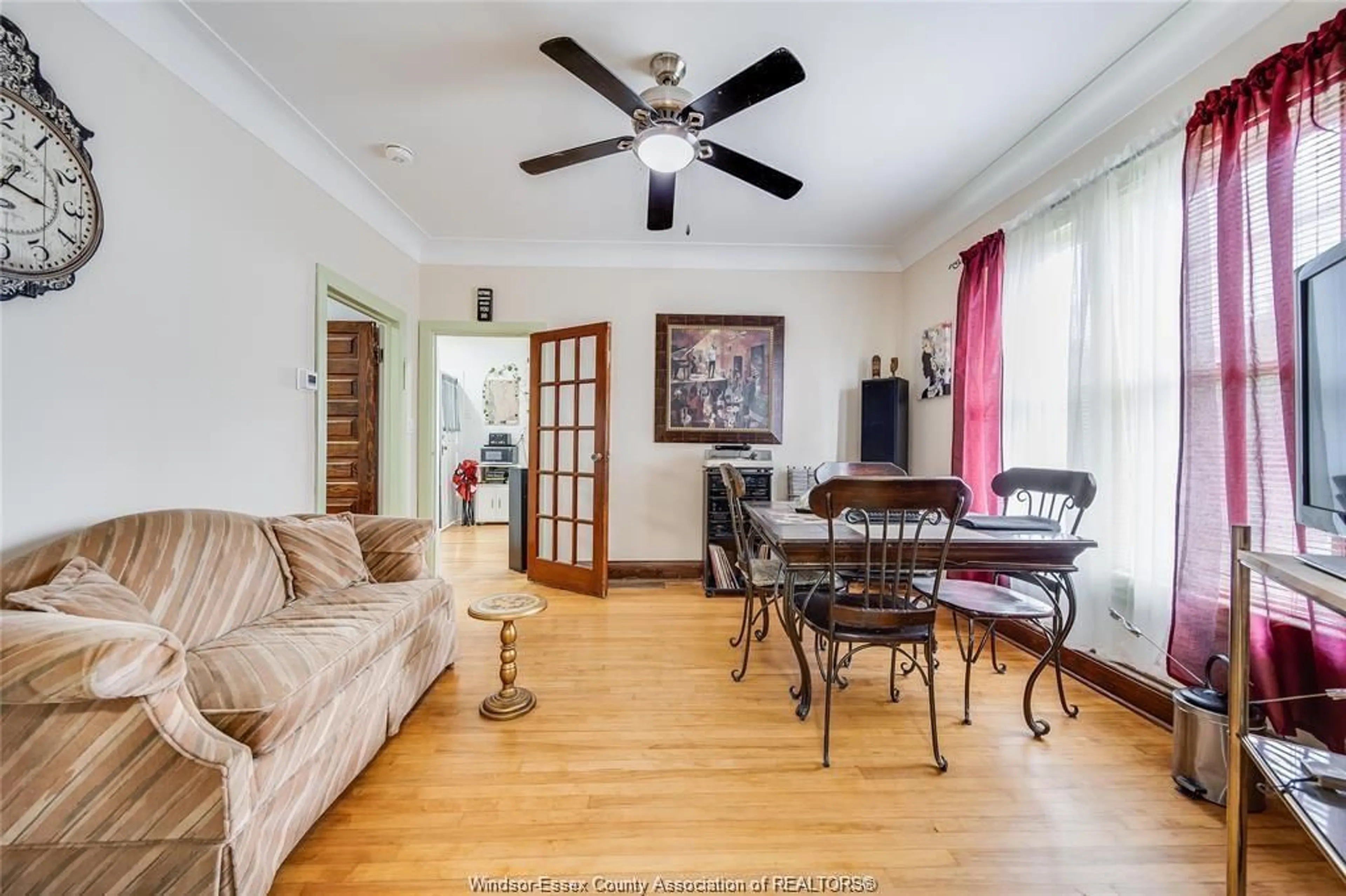 Living room with furniture, wood/laminate floor for 792 PIERRE Ave, Windsor Ontario N9A 2K5