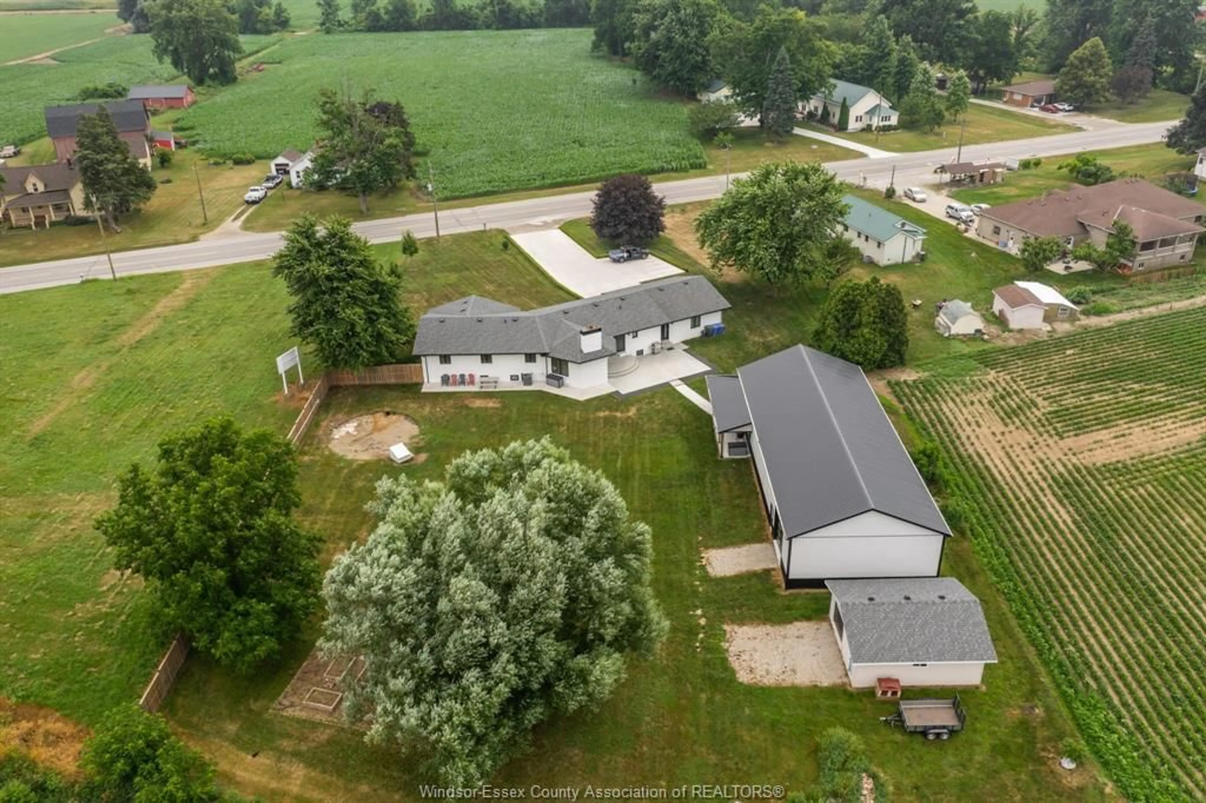 A pic from outside/outdoor area/front of a property/back of a property/a pic from drone, unknown for 429 HIGHWAY 3, Leamington Ontario N8H 3V6