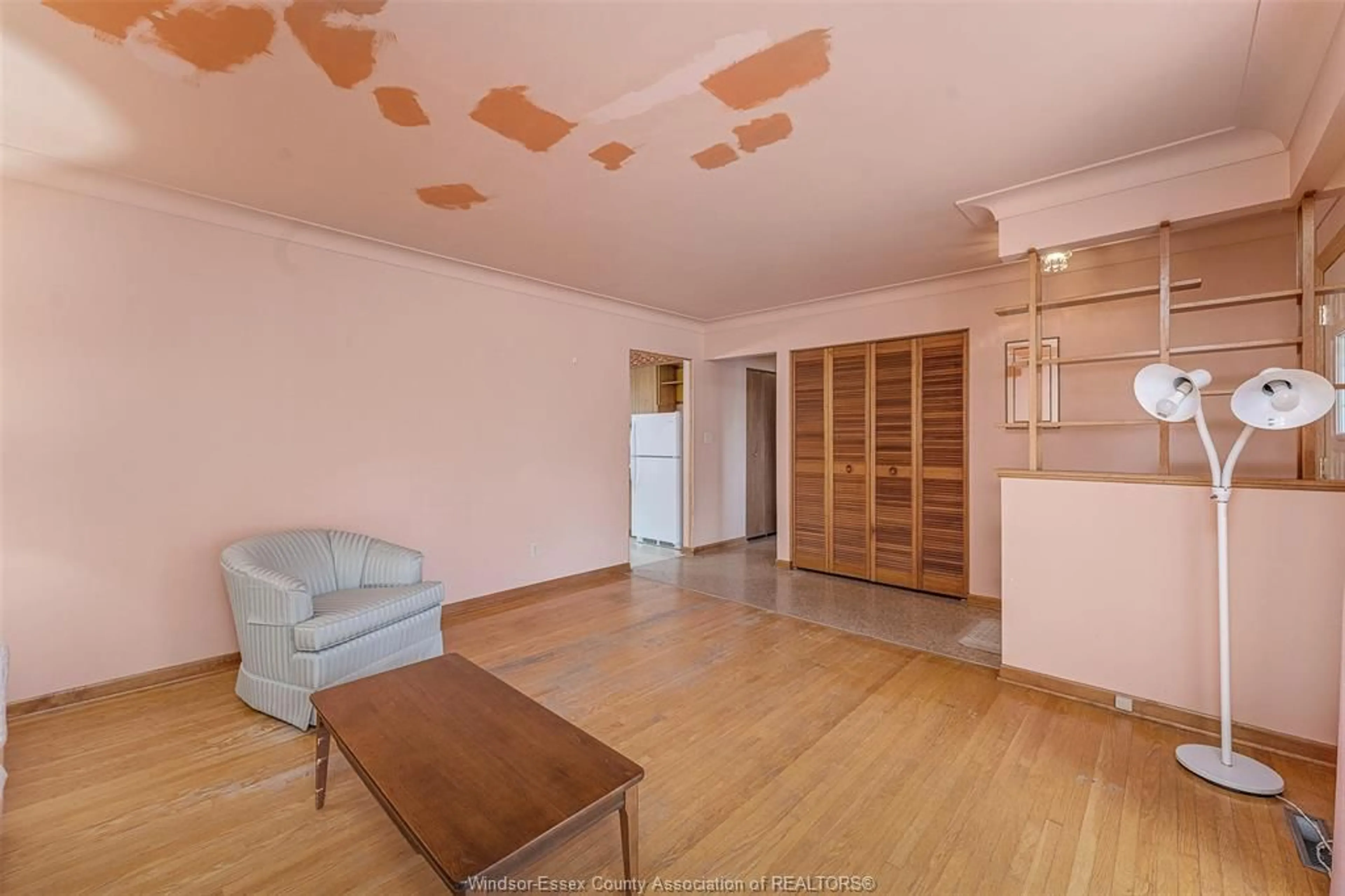 Living room with furniture, wood/laminate floor for 891 FRANK Ave, Windsor Ontario N8S 3P4
