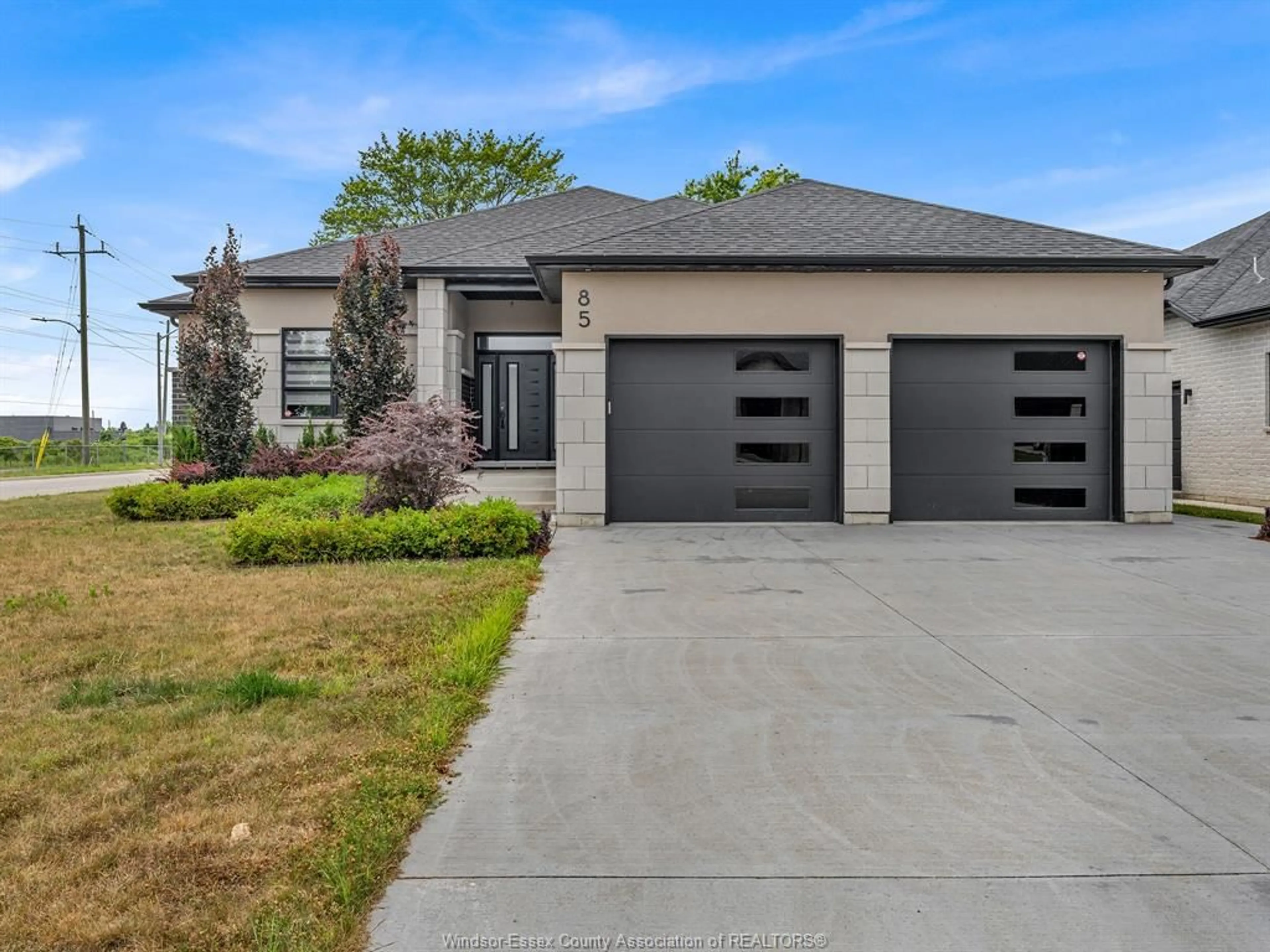Home with brick exterior material, street for 85 OLIVE Dr, Leamington Ontario N8H 0E7
