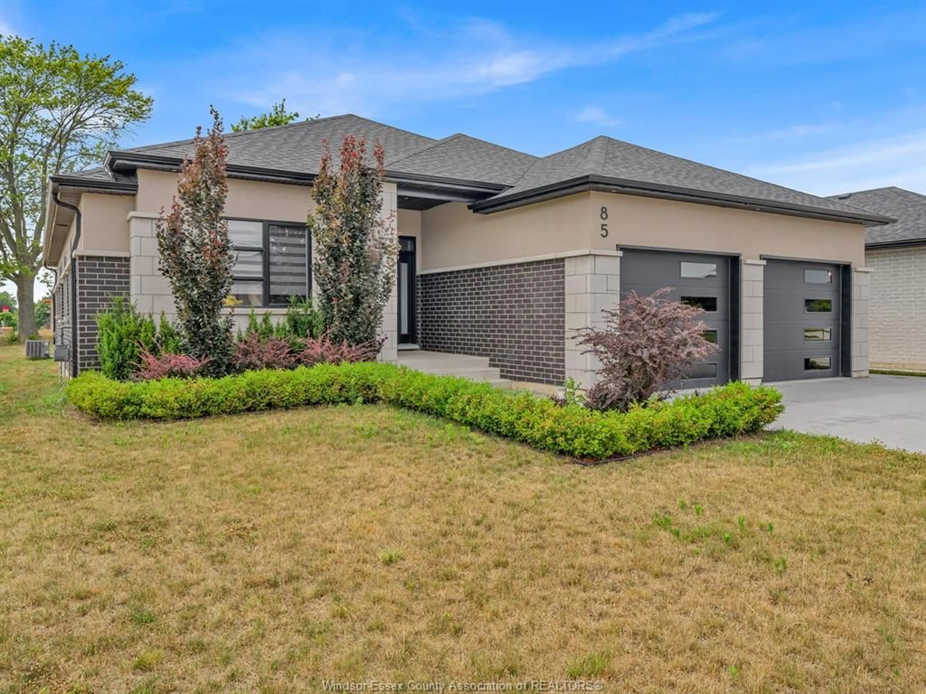 Home with brick exterior material, street for 85 OLIVE Dr, Leamington Ontario N8H 0E7