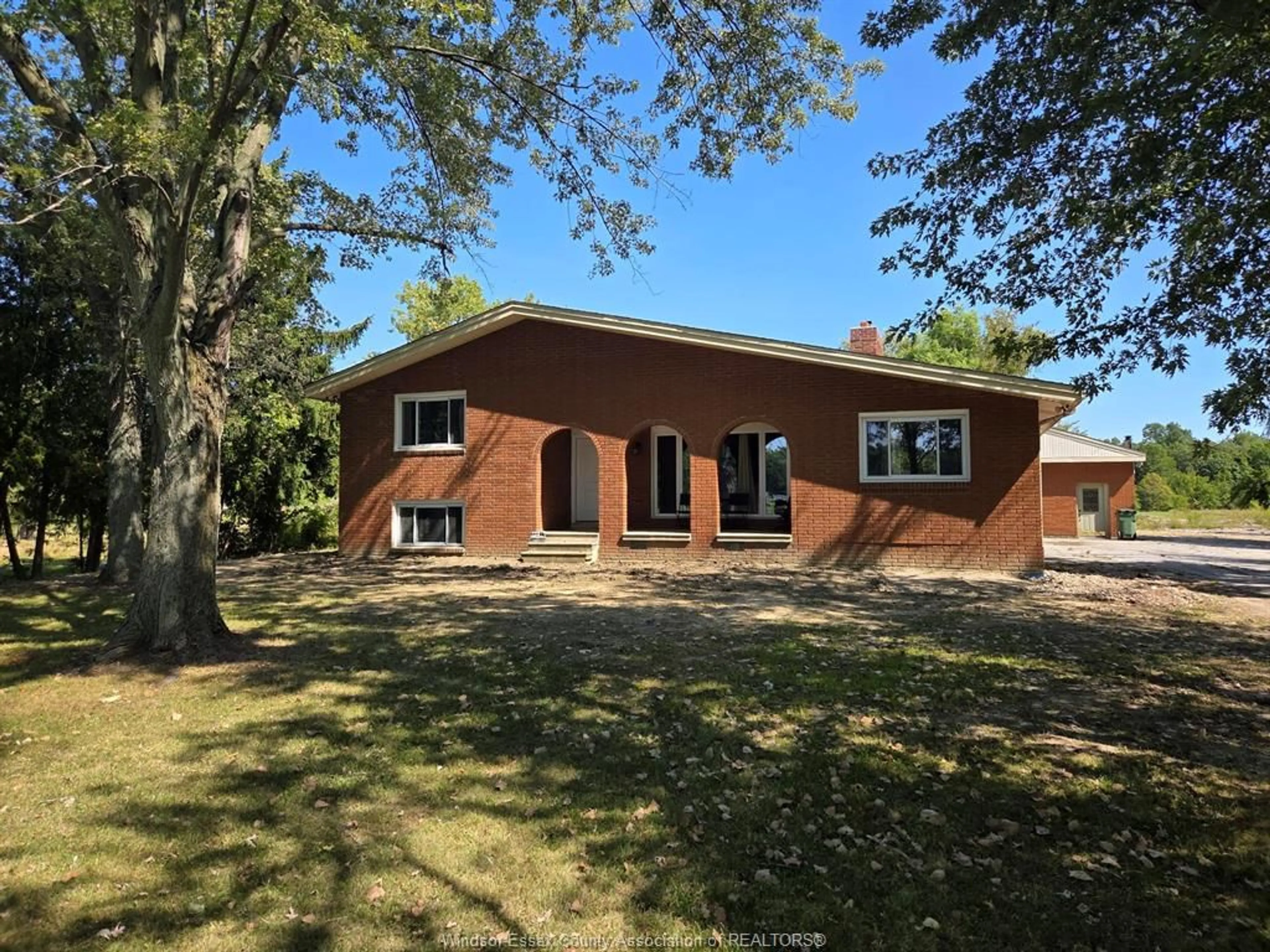 Home with brick exterior material, street for 7047 GIARDINI Sideroad, Essex Ontario N0R 1J0