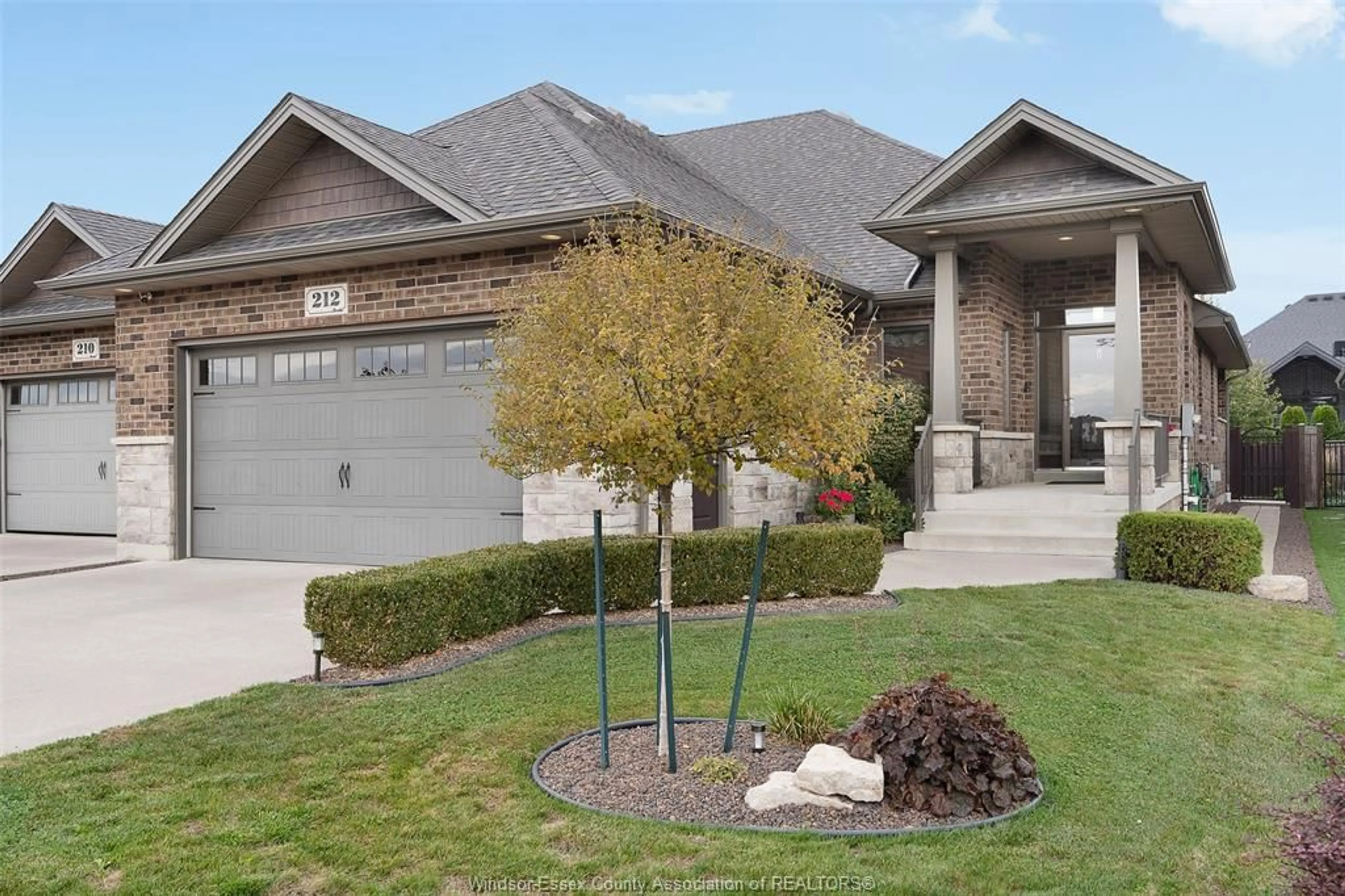 Home with brick exterior material, street for 212 WOODYCREST, Kingsville Ontario N9Y 0B8