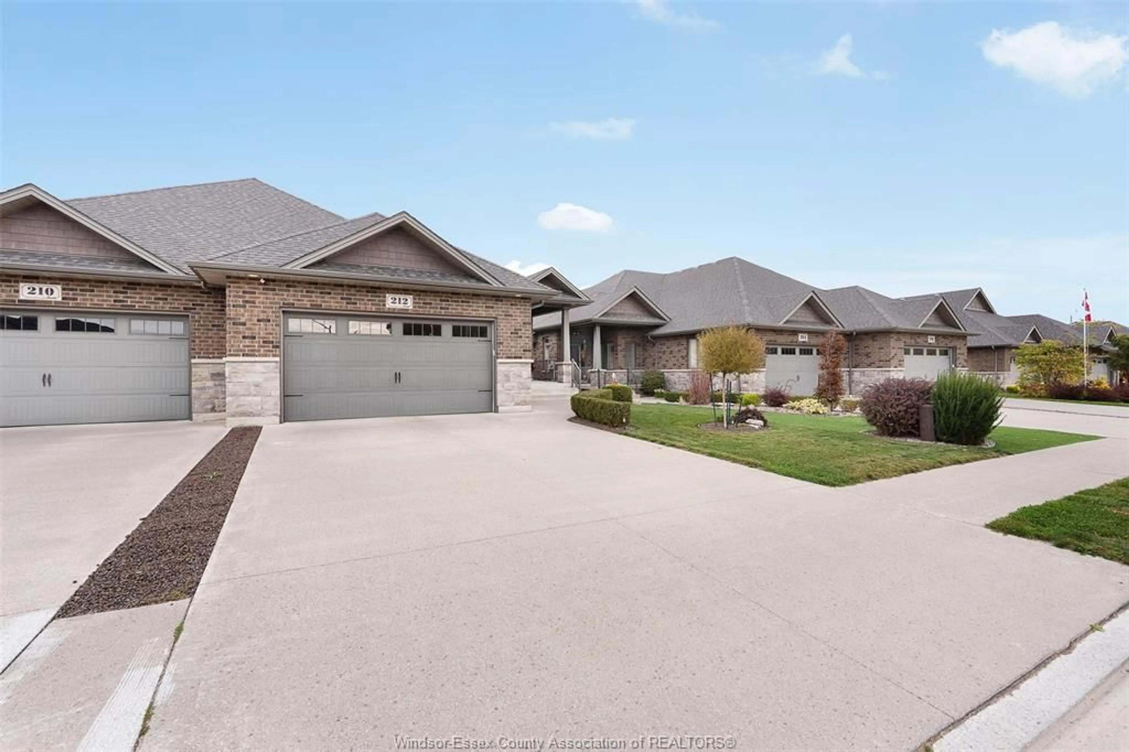 Home with brick exterior material, street for 212 WOODYCREST, Kingsville Ontario N9Y 0B8
