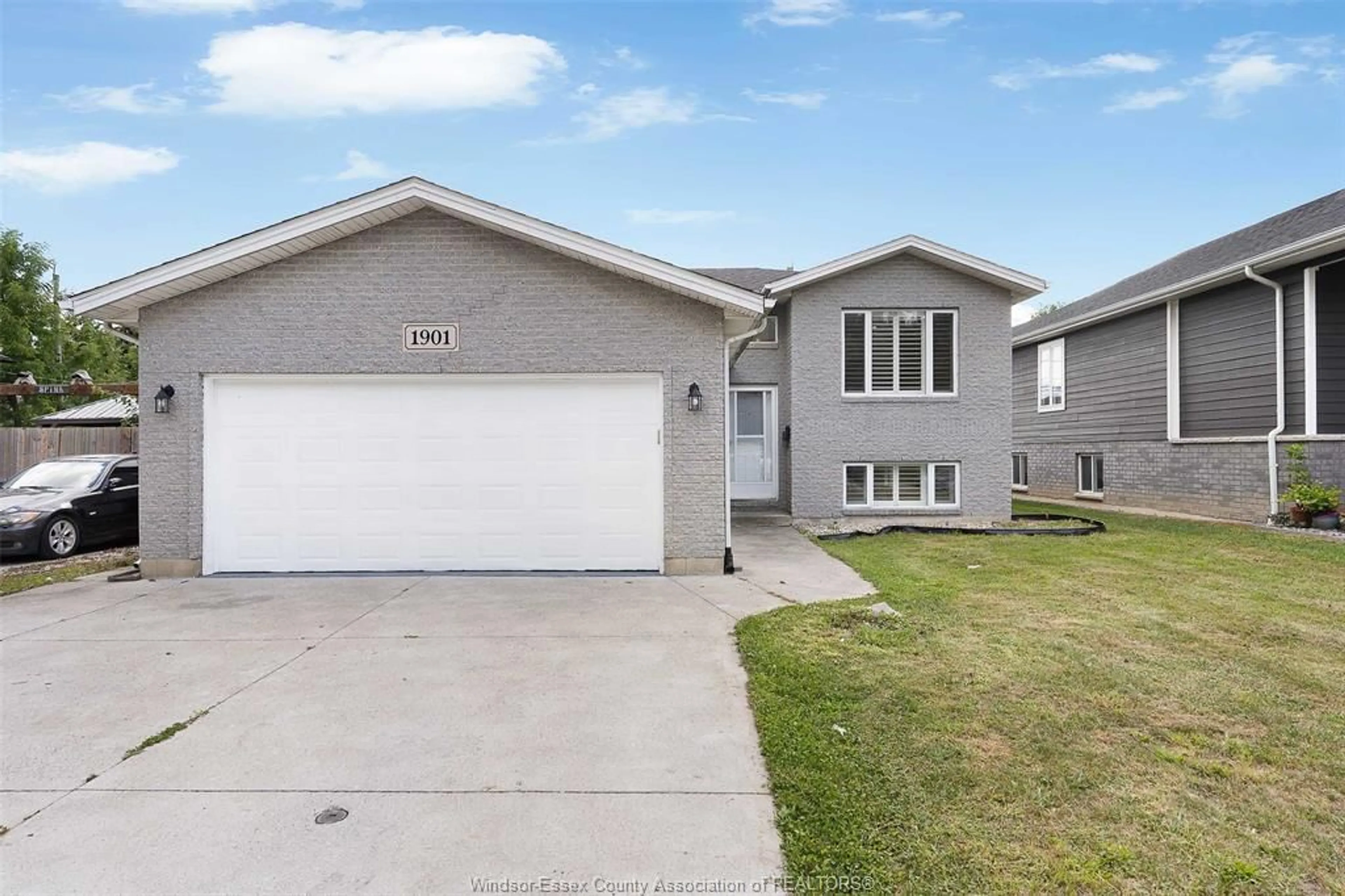 Home with vinyl exterior material, street for 1901 Longfellow Ave, Windsor Ontario N9B 3J5