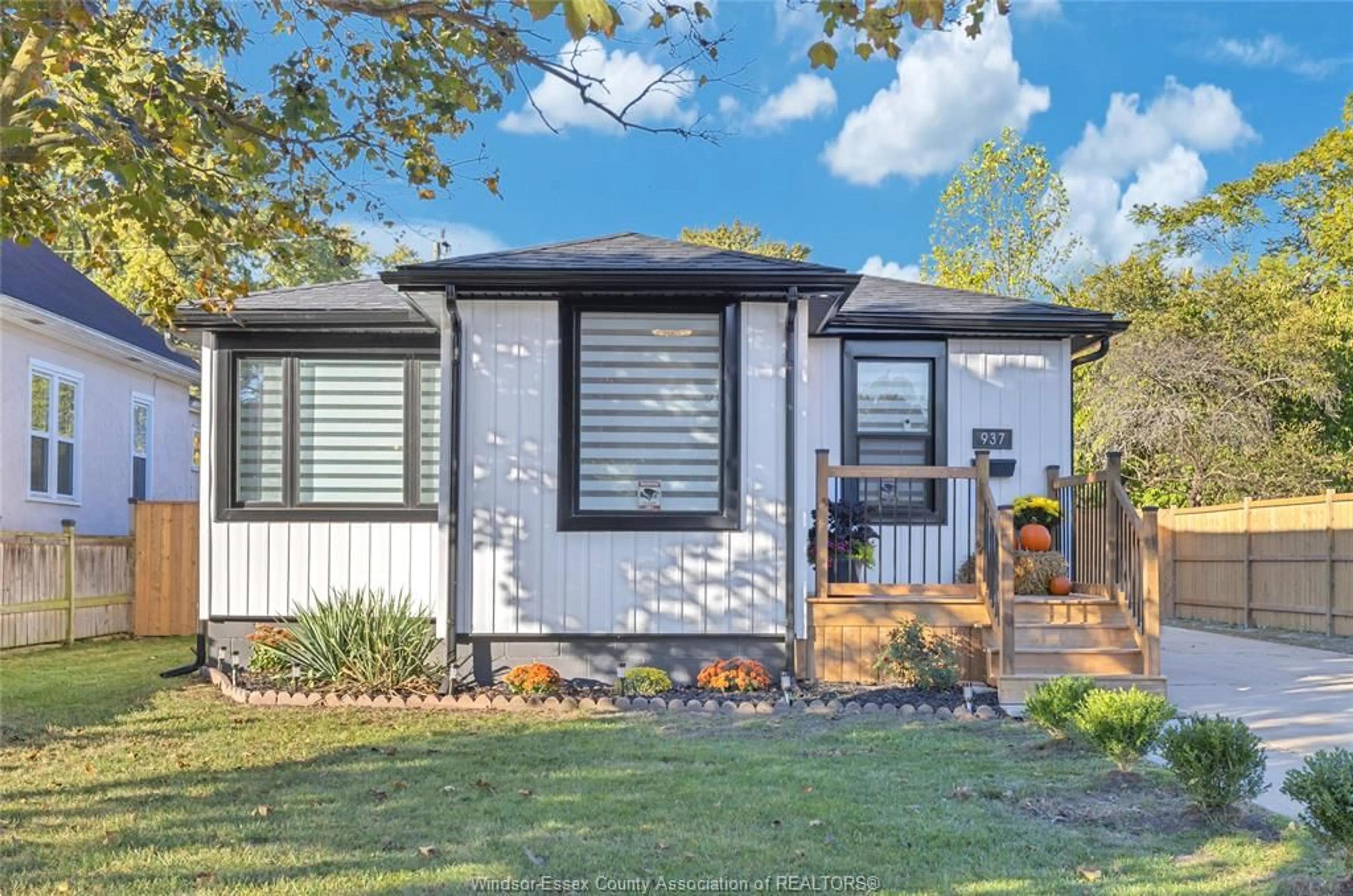 Home with vinyl exterior material, street for 937 LAUZON Rd, Windsor Ontario N8S 3M4