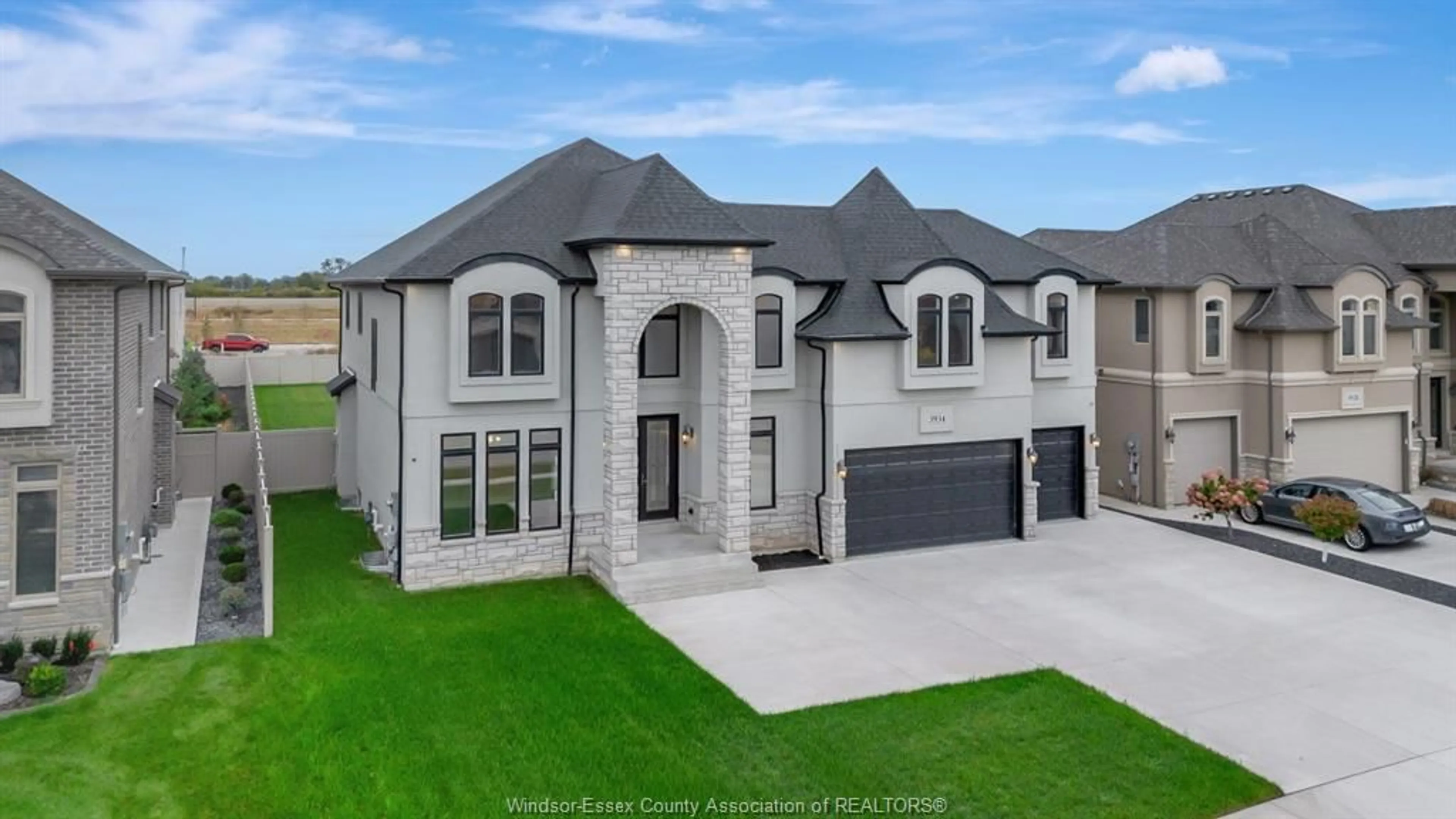Home with brick exterior material, street for 3934 LASALLE WOODS Blvd, LaSalle Ontario N9H 0G6