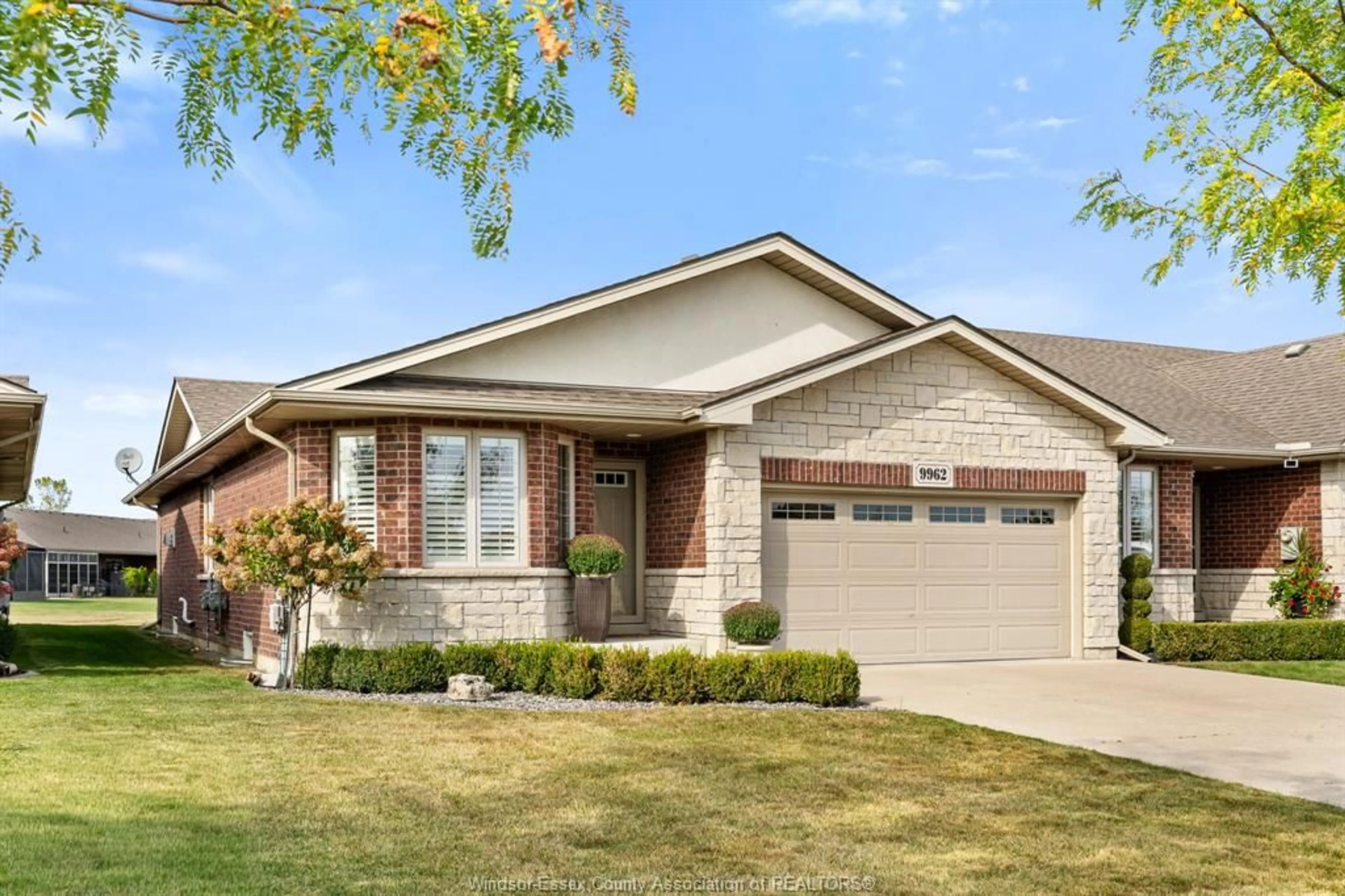 Home with brick exterior material, street for 9962 Little River Blvd, Windsor Ontario N8P 1Z2
