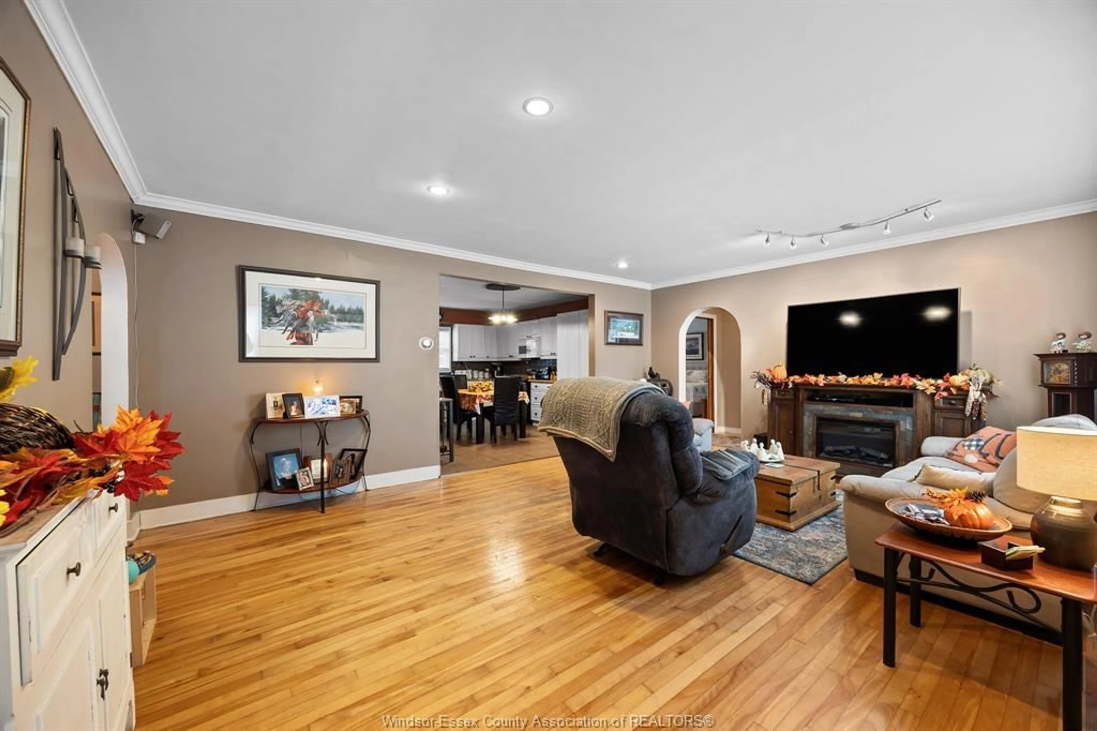 Living room with furniture, wood/laminate floor for 244 ALMA St, Amherstburg Ontario N9V 1A7