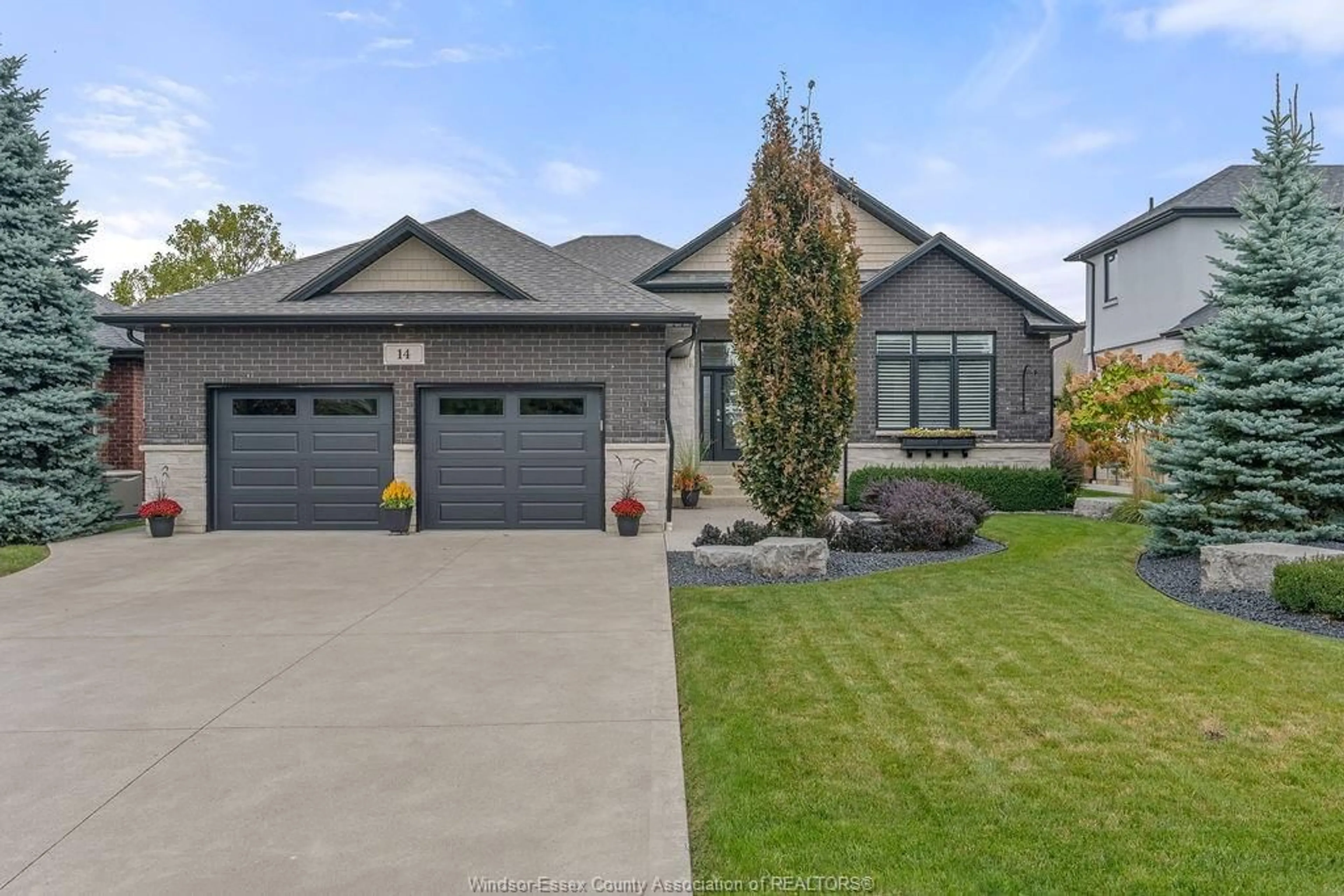 Home with brick exterior material, street for 14 WISTERIA Lane, Kingsville Ontario N9Y 0E3