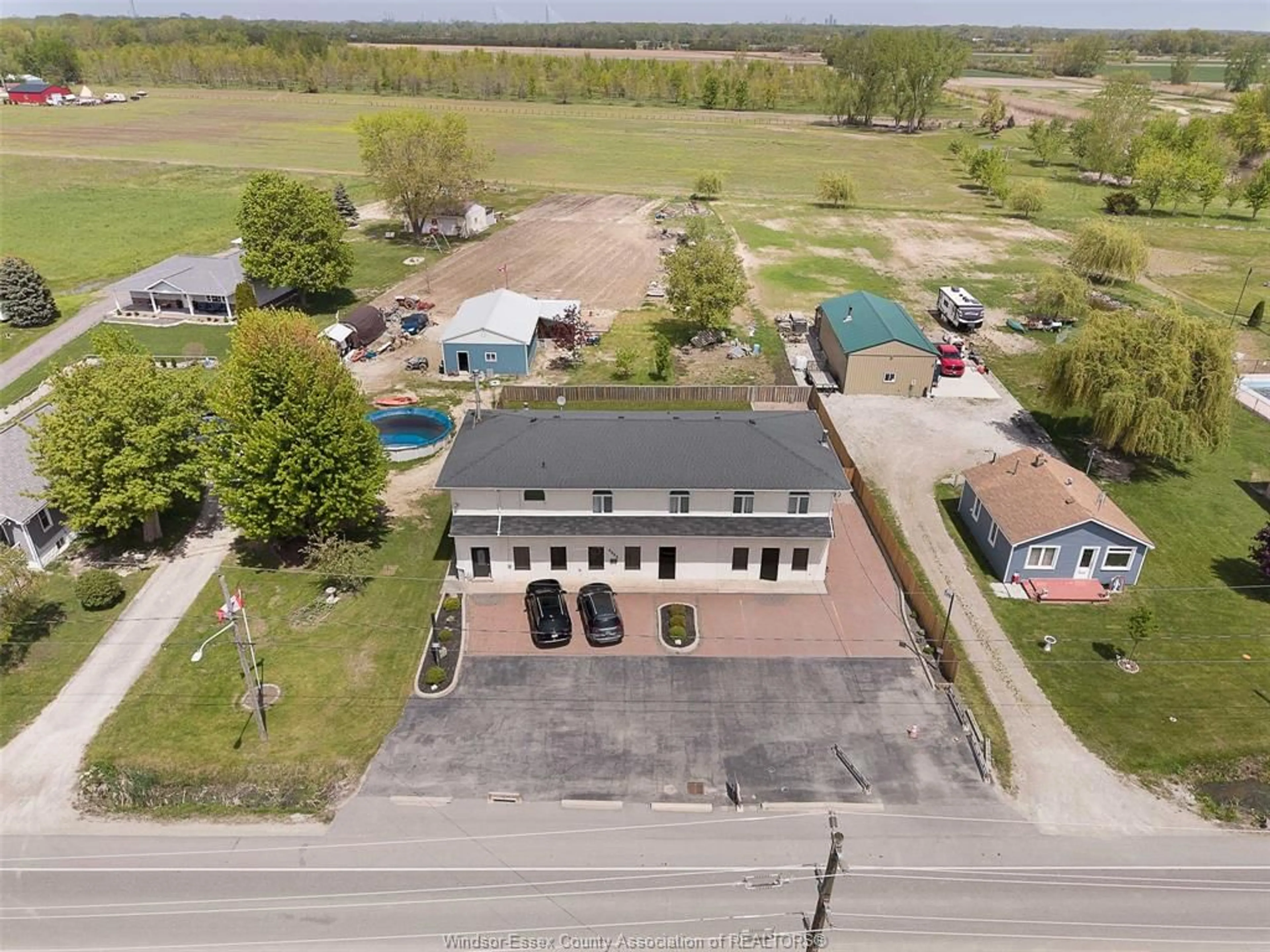 A pic from outside/outdoor area/front of a property/back of a property/a pic from drone, unknown for 9553 MALDEN Rd, LaSalle Ontario N9J 2W5