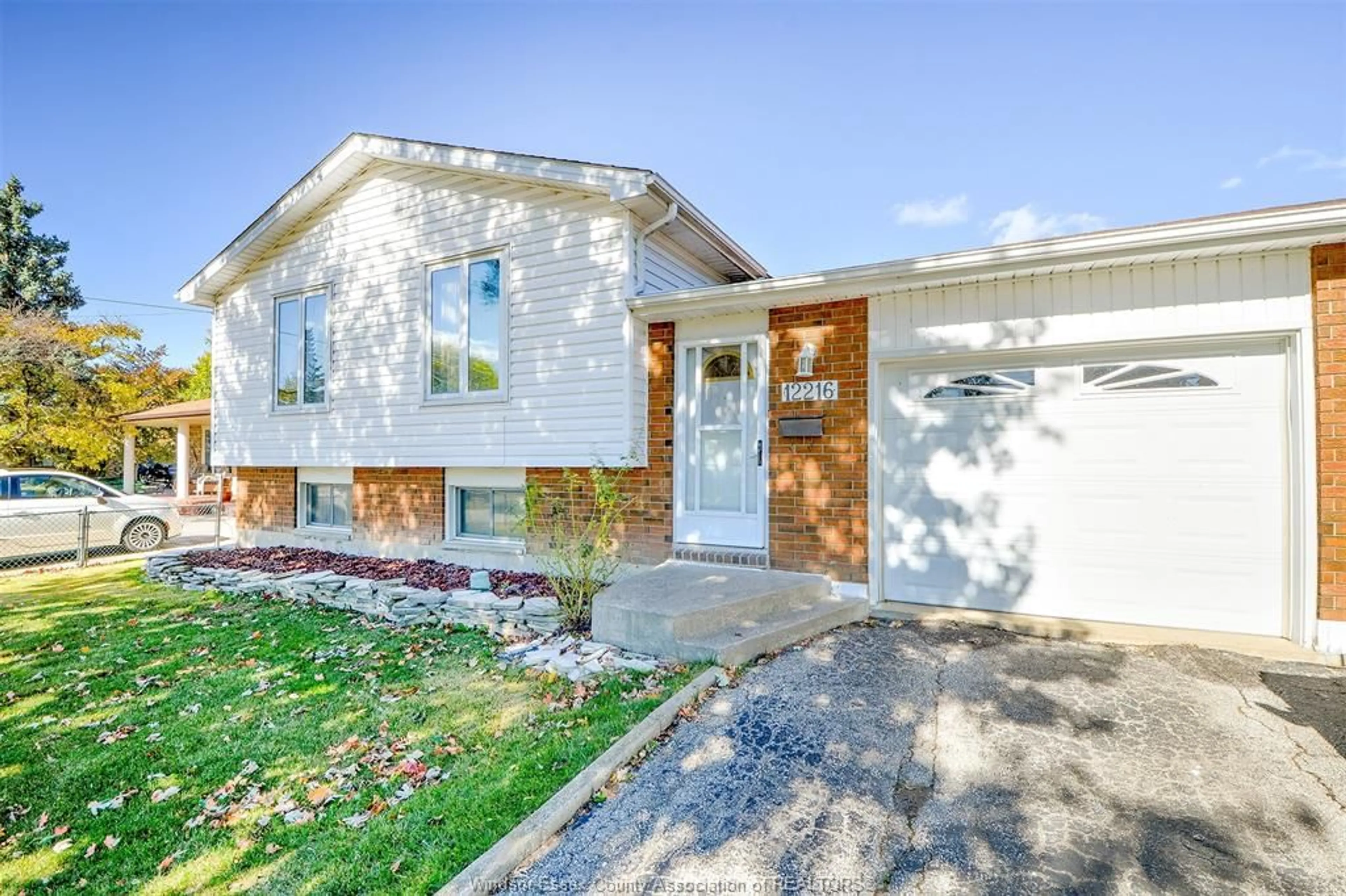 Home with vinyl exterior material, street for 12216 DILLON, Tecumseh Ontario N8N 3K9