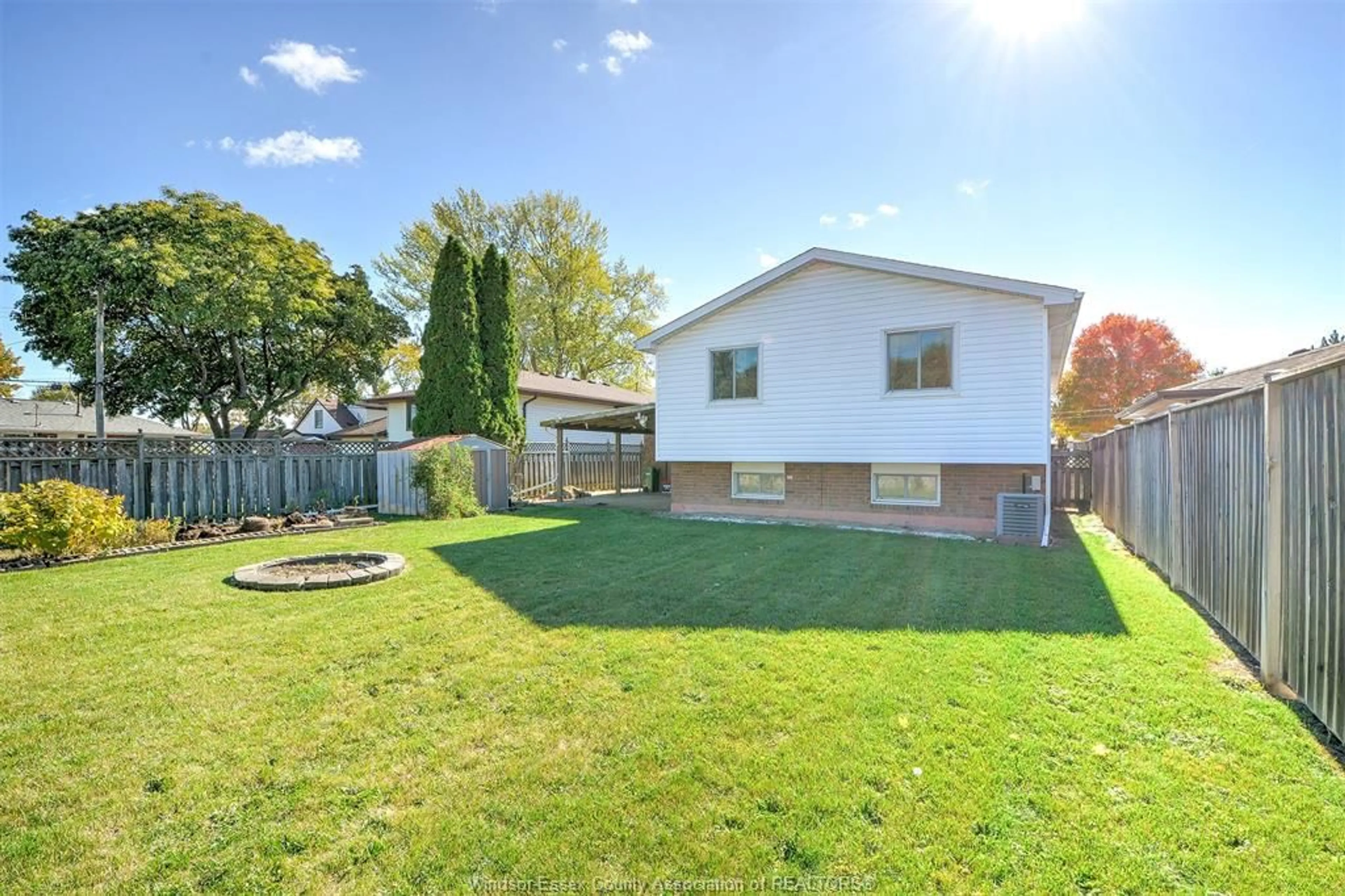 A pic from outside/outdoor area/front of a property/back of a property/a pic from drone, street for 12216 DILLON, Tecumseh Ontario N8N 3K9