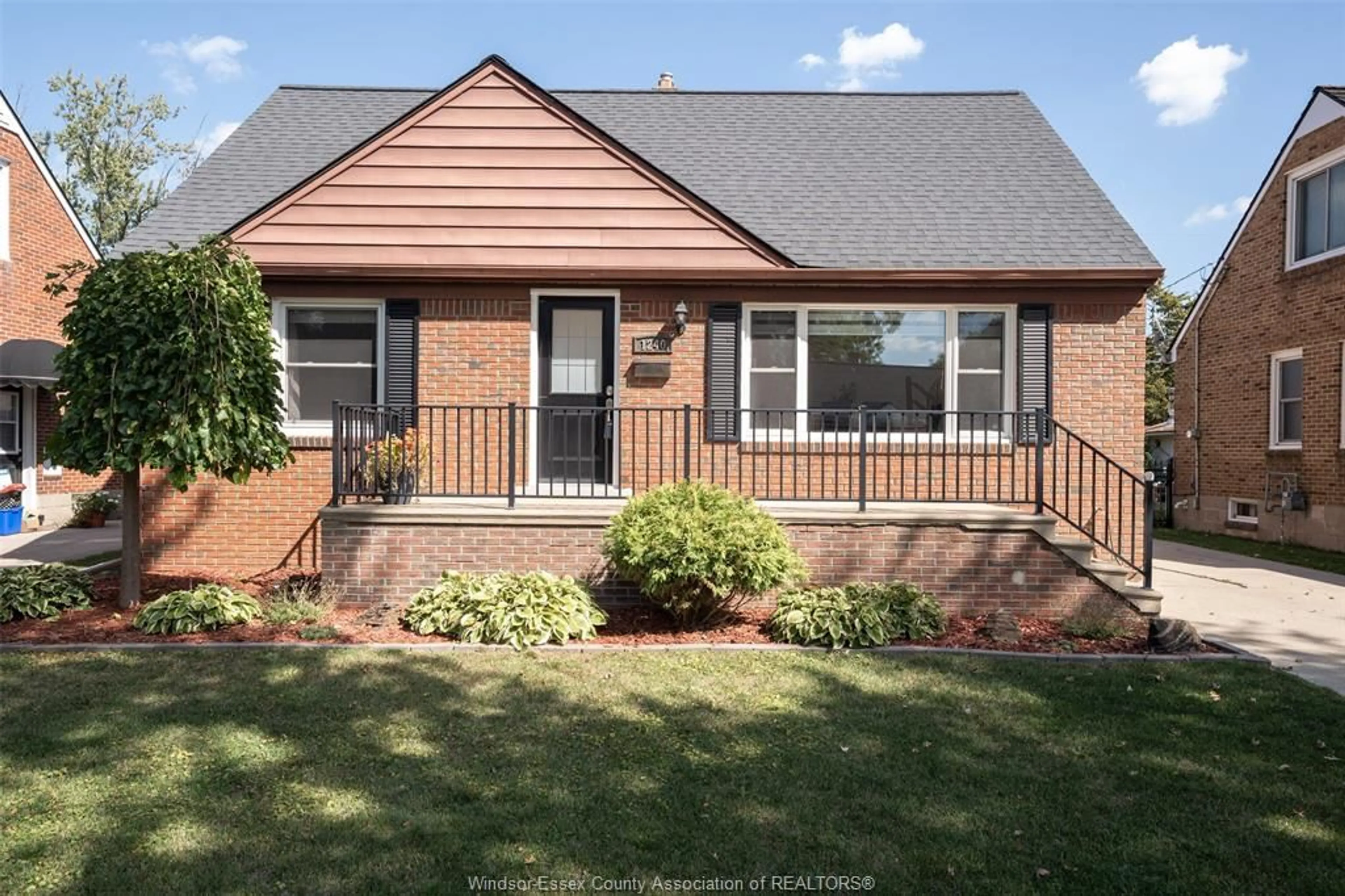 Home with brick exterior material, street for 1240 BELLE ISLE VIEW Blvd, Windsor Ontario N8S 3G7