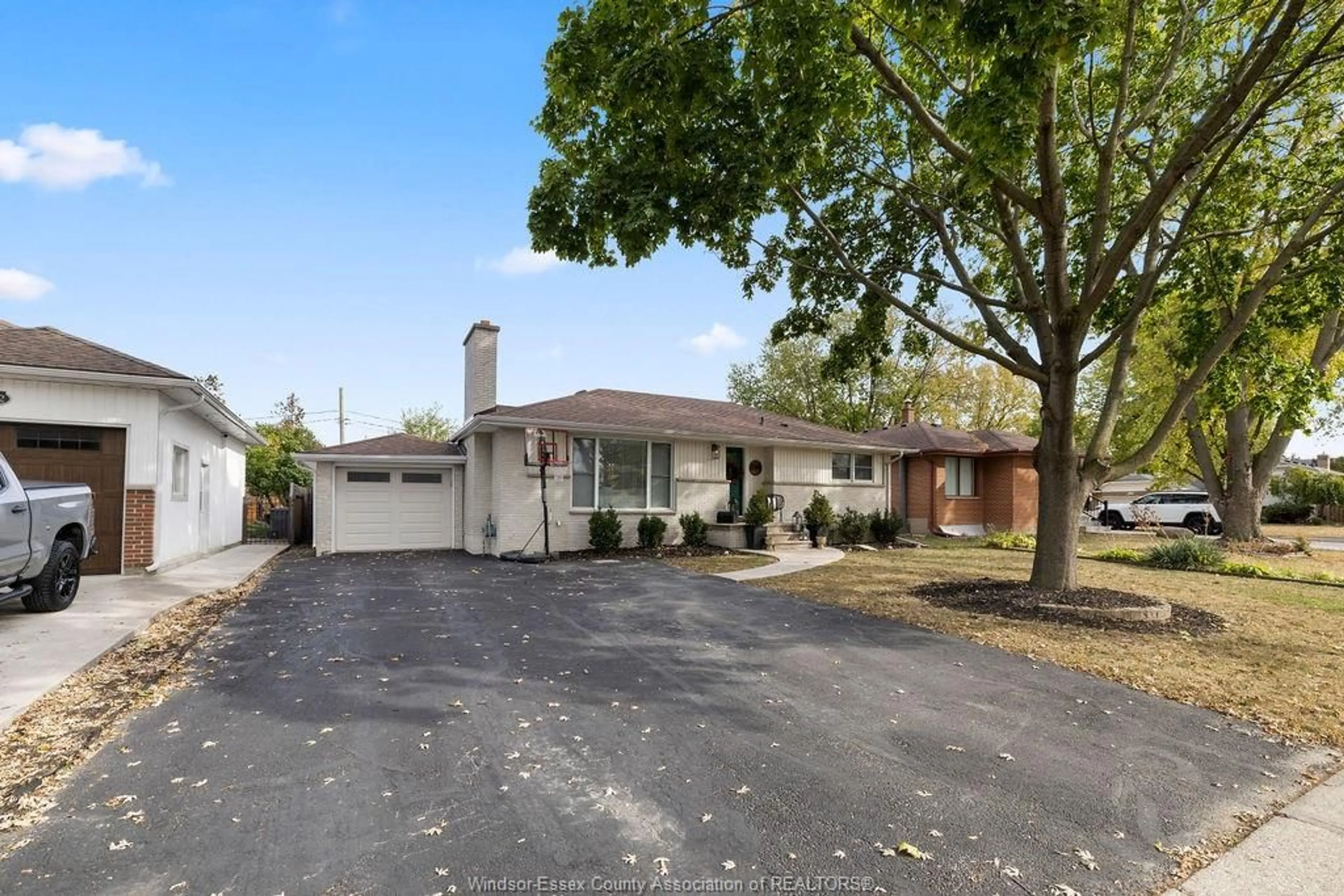Home with brick exterior material, street for 390 Grace Rd, Tecumseh Ontario N8N 2G7